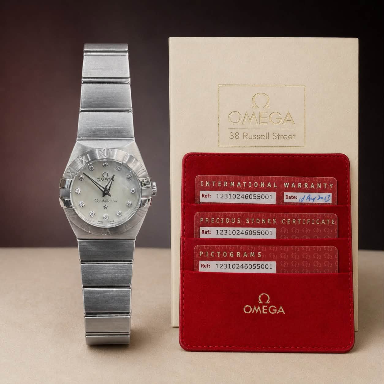 May be an image of wrist watch and text that says '5 2 OMEGA 38 Russell 38RussellStreet Street و OMEG OMEC 6 を سaیعسG و 유 INTERNATIONAL WARRANTY Ref: Date: 1dAay2013…