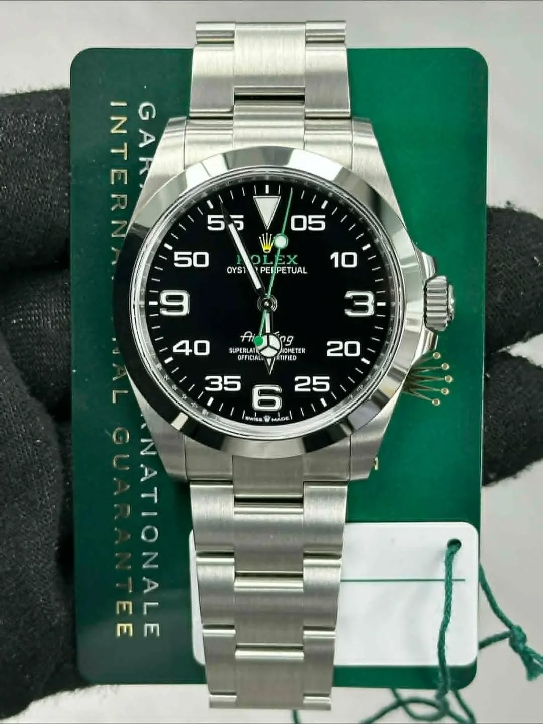 May be an image of wrist watch and text that says '盜可了 INTERI GAR 5万 OYS1 PERPETUAL SUPERLAH OFFICIALL p9 p9 ЛOHee HOMETER TIFIED 20 35 6 MADE 25 I SWISH E'
