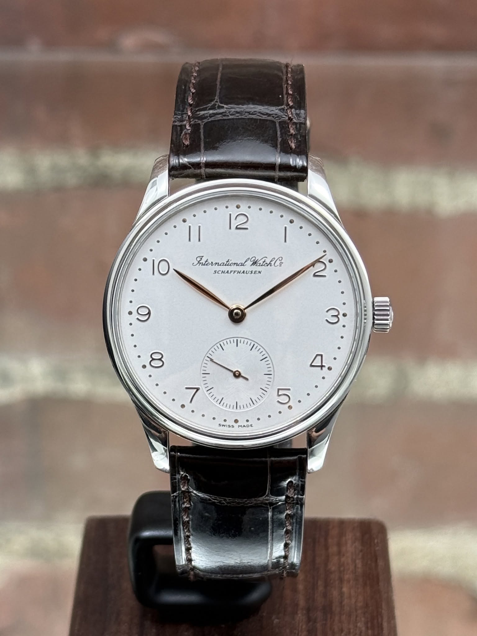 May be an image of wrist watch and text
