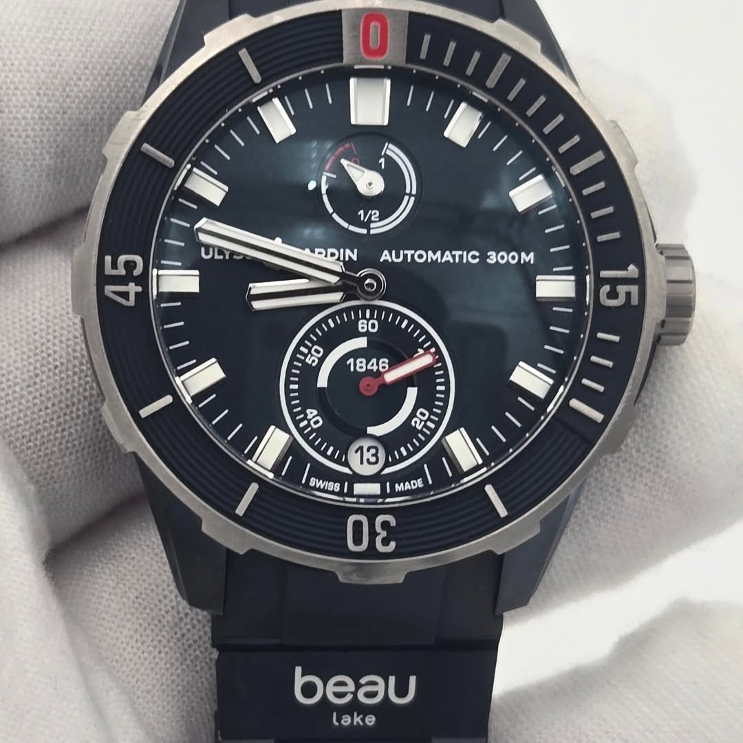 May be an image of digital watch and text that says 'O 1 1/2 45 NDIN AUTOMATIC300M 300M E 00 02 ឡុា O: MADE 13 WISR SWISS θε beau lake'