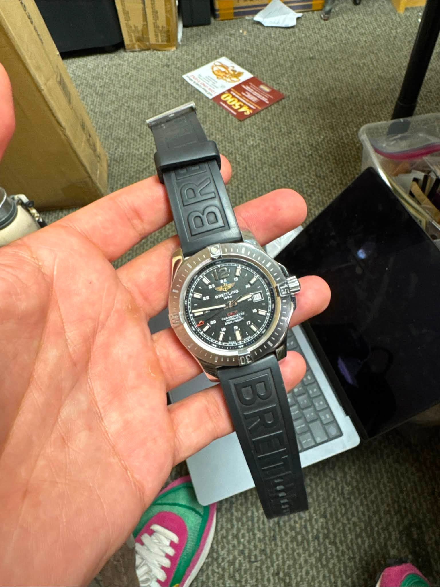 May be an image of digital watch and text