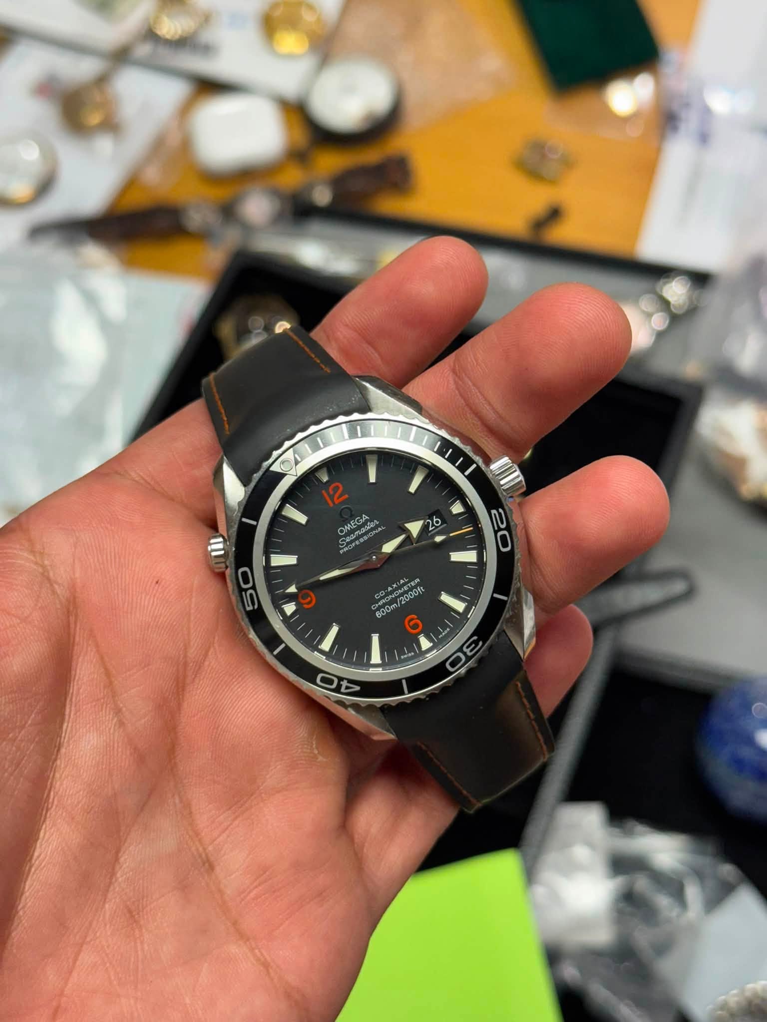 May be an image of wrist watch and text