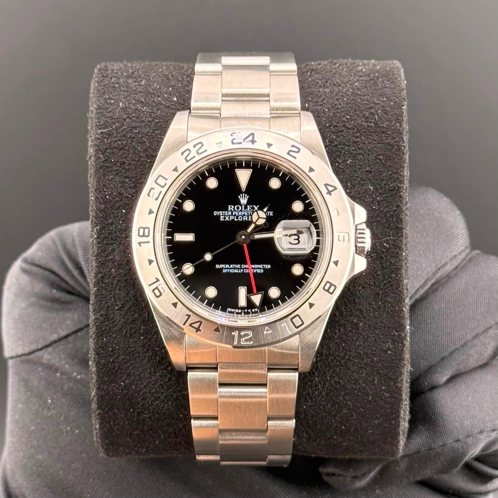 May be an image of wrist watch and text