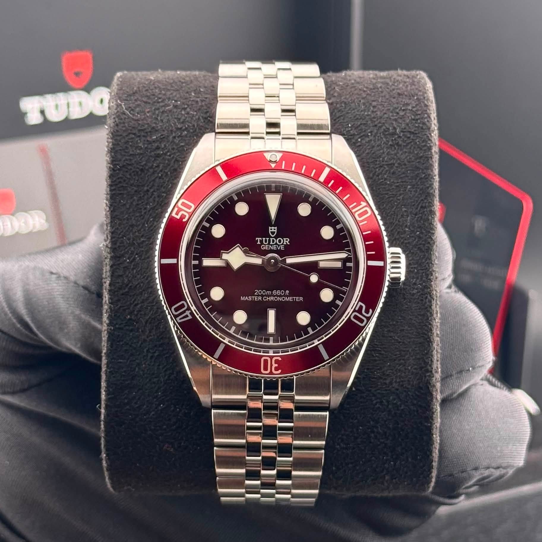 May be an image of wrist watch and text