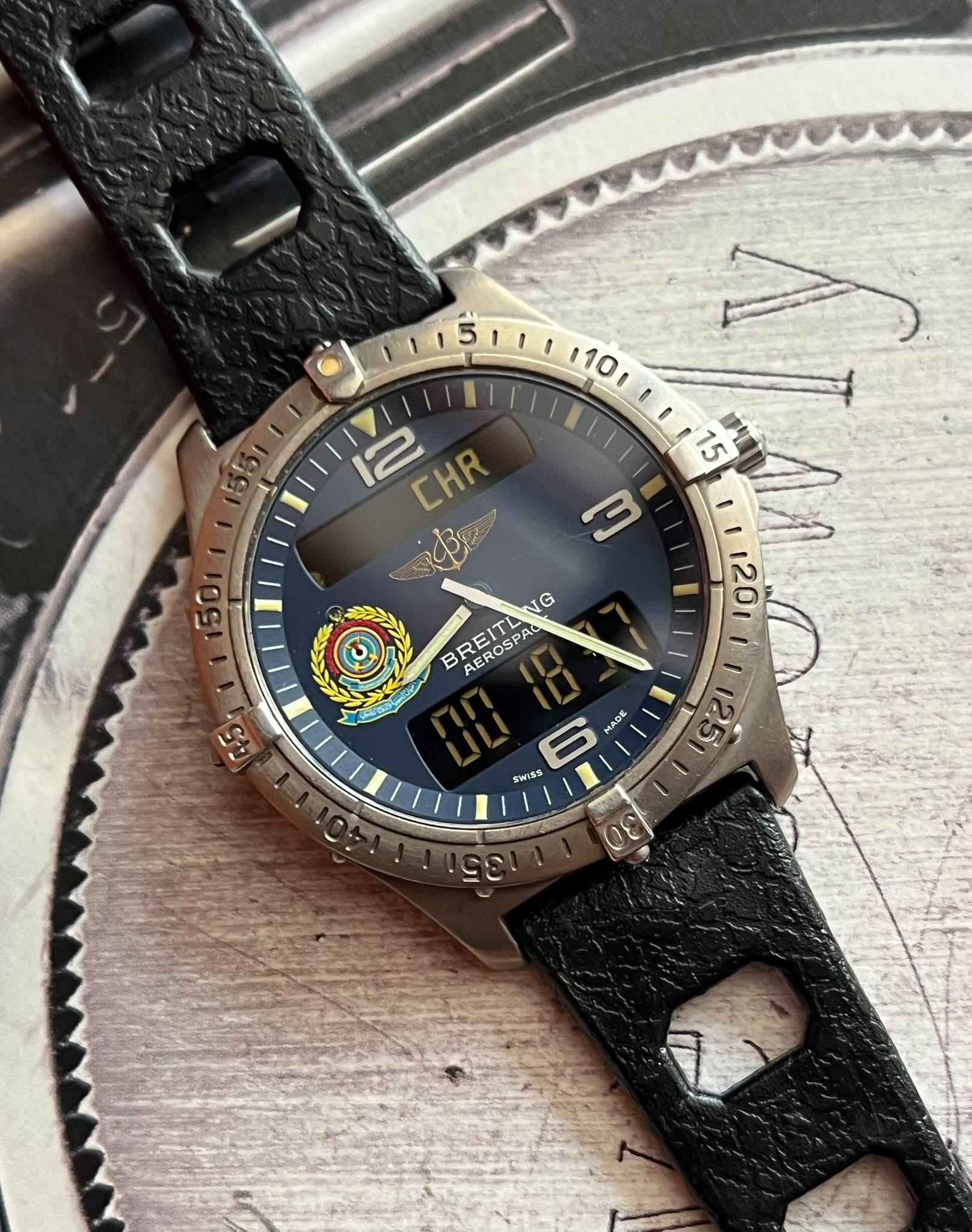 May be an image of digital watch and text that says ' CHR Ψe BREITLING NG EROSPAC 경교 បរូ ADE dE SWISS e'