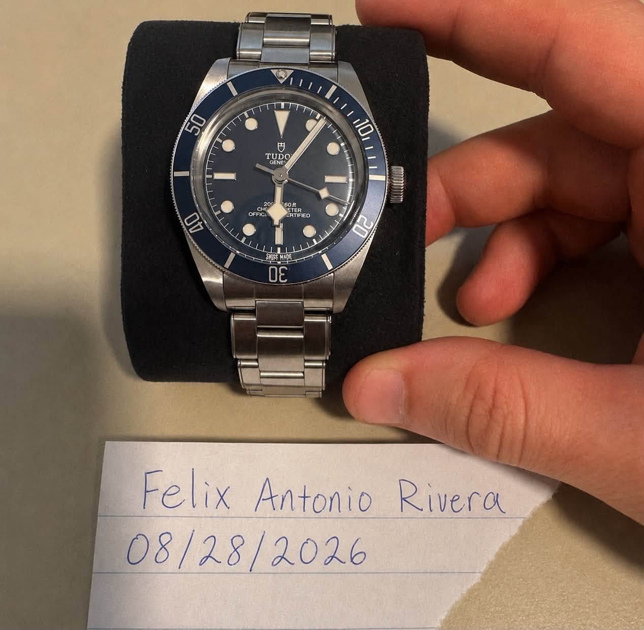 May be an image of wrist watch and text that says 'سلا 50 円 TUD GRNE TUDO DO 10 - 20 oFFc GDR CRTIFE SL EL 40 0 mr 20 3 Felix Antonio Rivera 08/28/2026 08/28 8/2026'