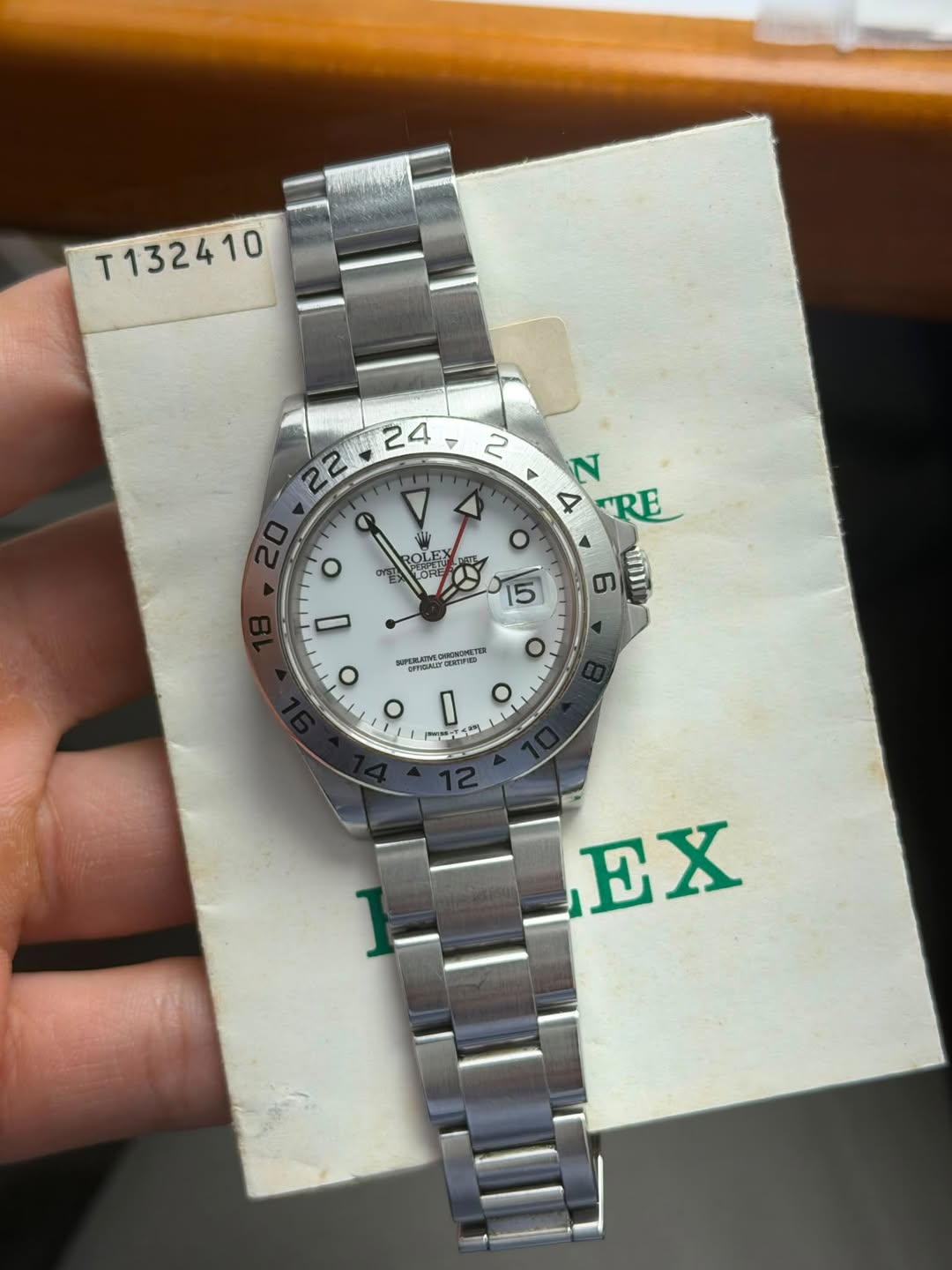 May be an image of wrist watch and text