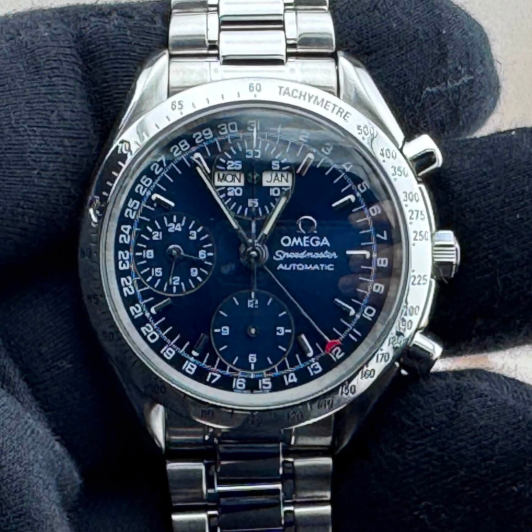 May be an image of wrist watch and text
