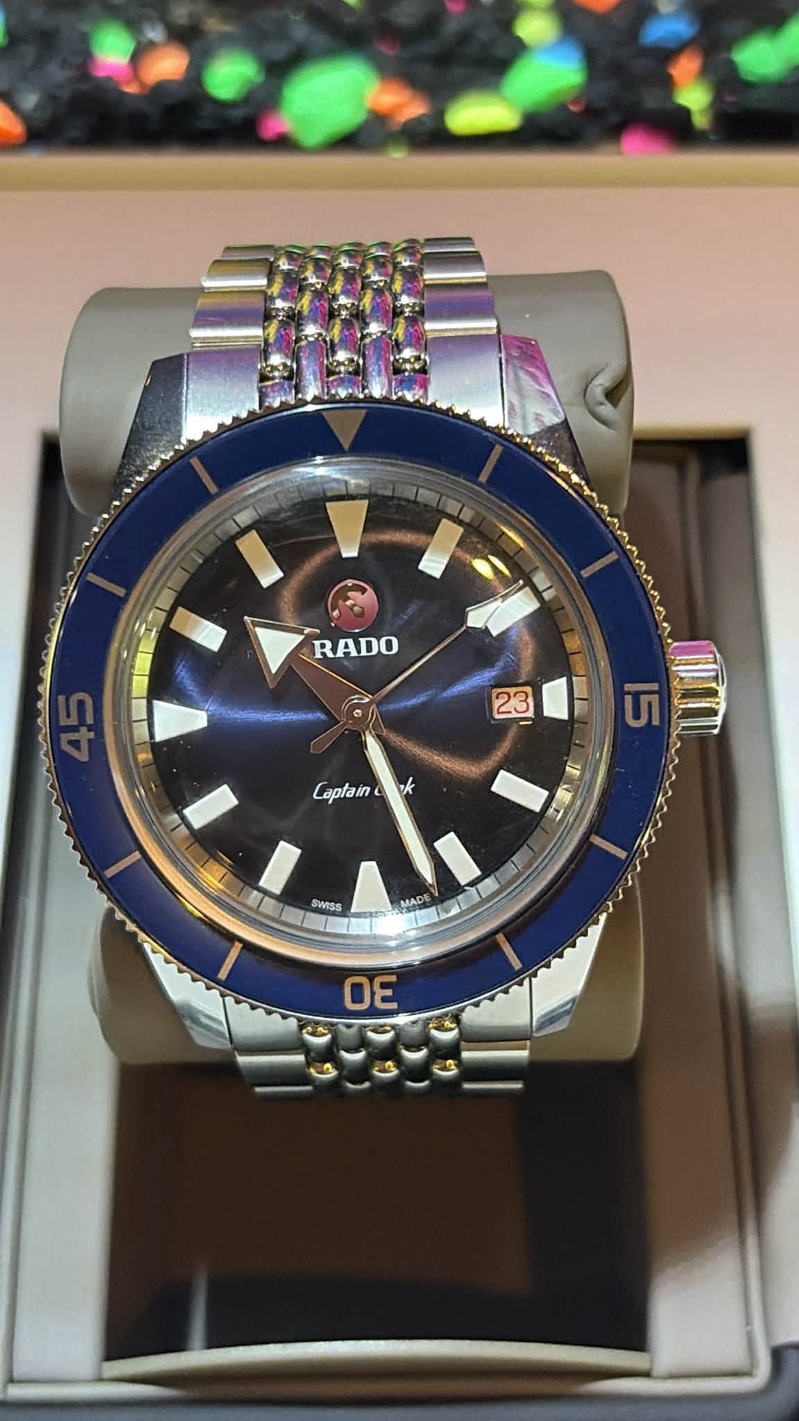 May be an image of wrist watch and text that says '温都 RADO 23 15 1 Laplain k 11 T SWISS MADE m'