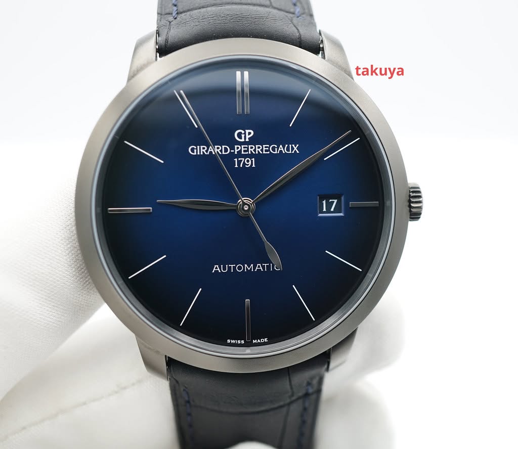 May be an image of wrist watch and text that says 'takuya GP GIRARD-PERREGAUX GIRARD- 1791 17 AUTOMAT SWISS MADE'