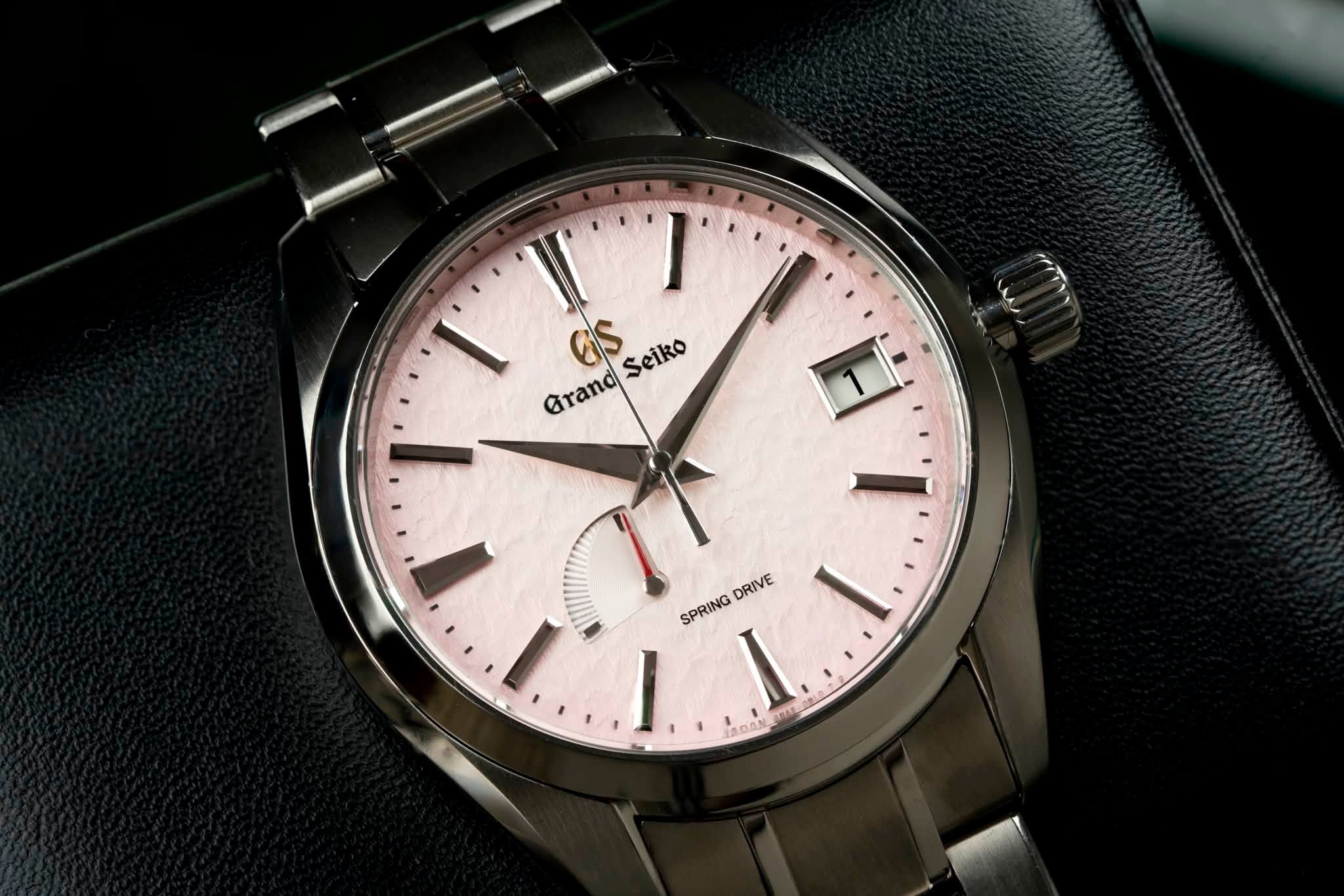 May be an image of wrist watch and text that says '6S Seiko Seiko Grand DRIVE SPRING I. ١'