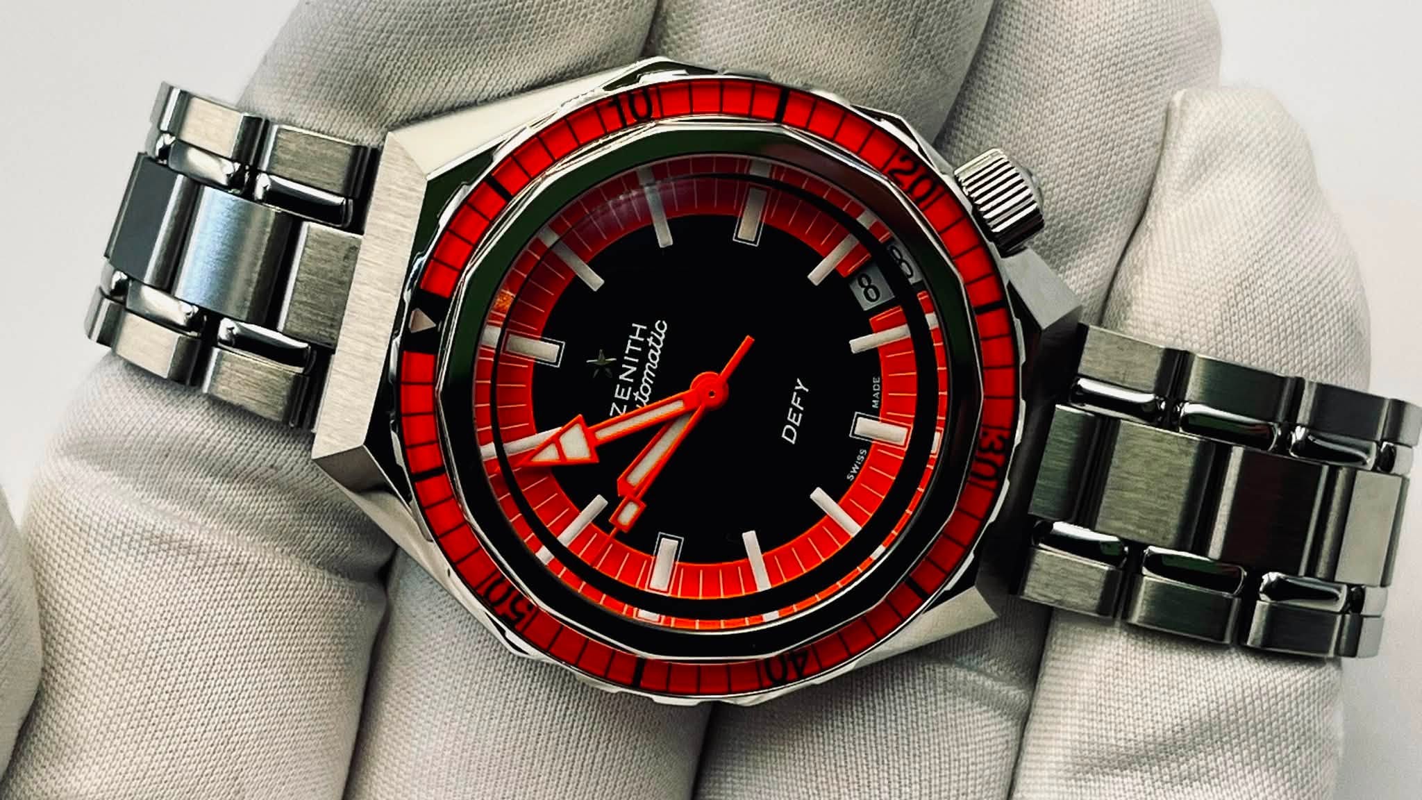 May be an image of wrist watch and text