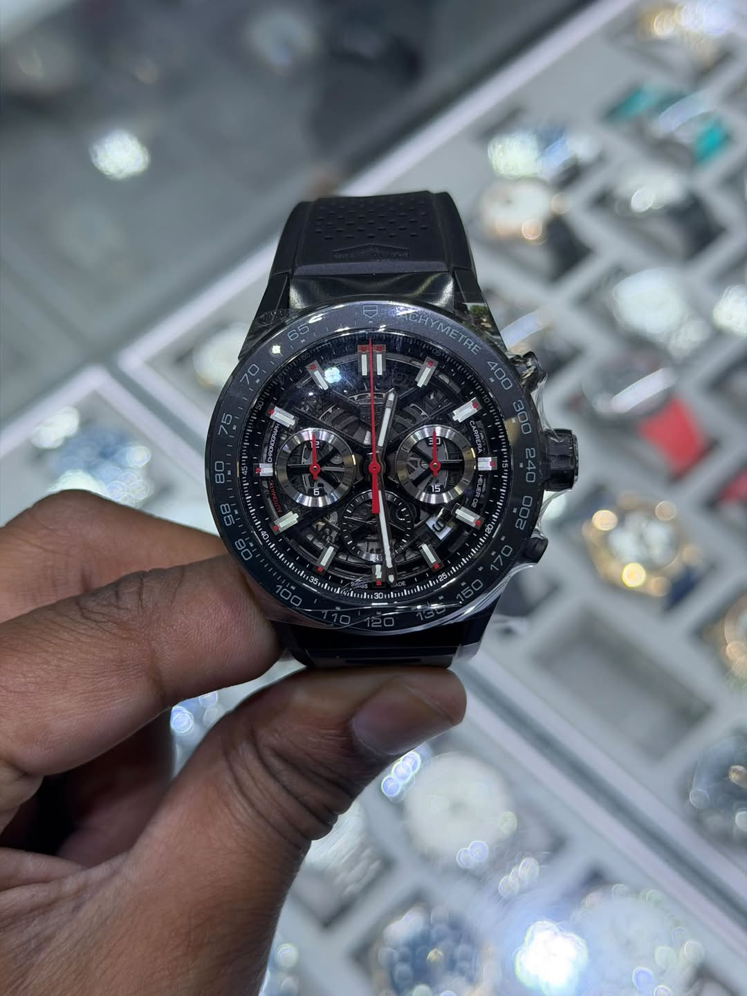 May be an image of wrist watch and text
