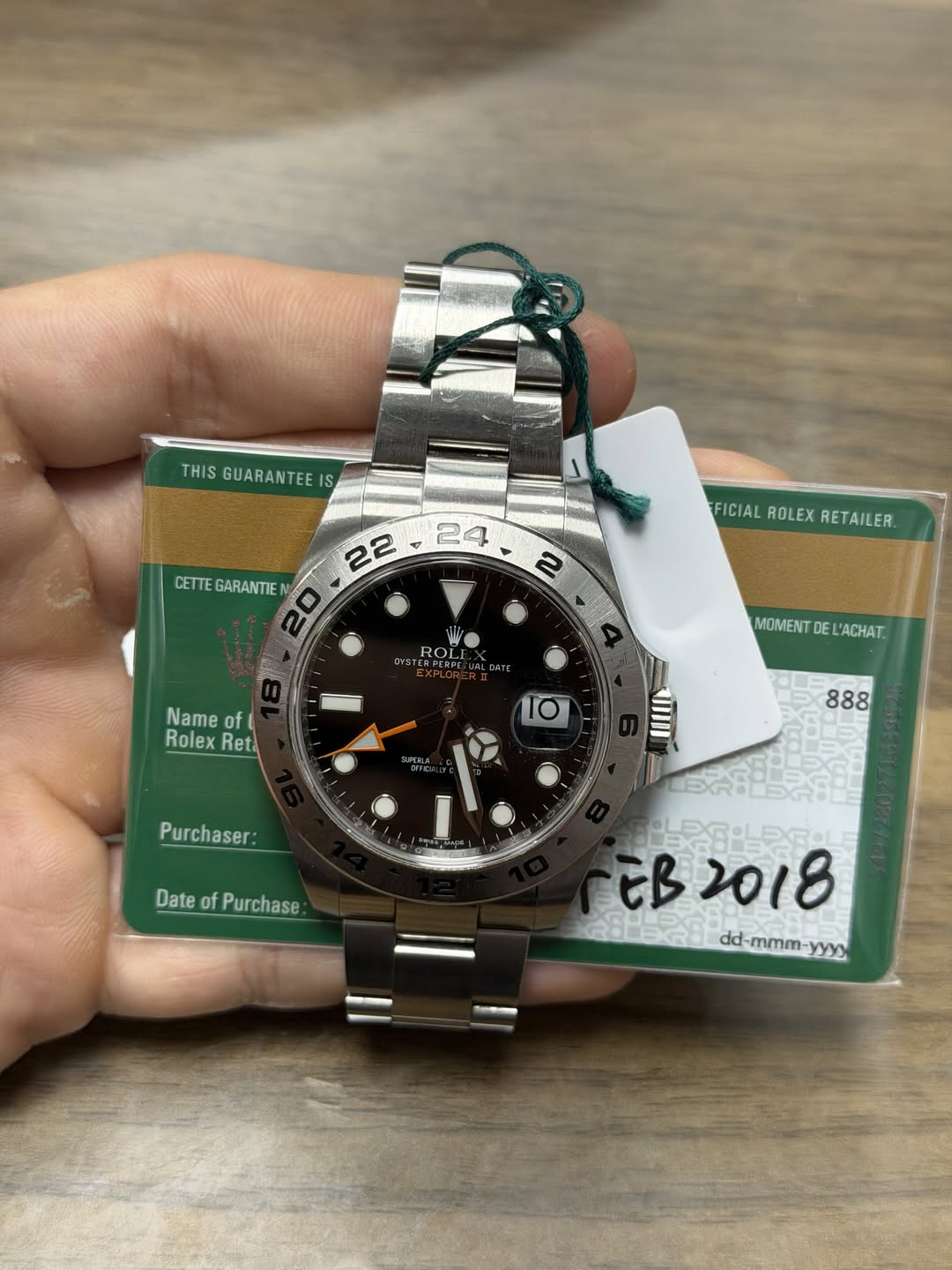 May be an image of wrist watch and text that says 'THIS GUARANTEE HISGUARANTEE IS CETTEGARANTIEN CETTE FICIAL FICIALROLEXRETAILER. ROLEX RETAILER. 2 VIN OYS ROL Name RolexRet of…