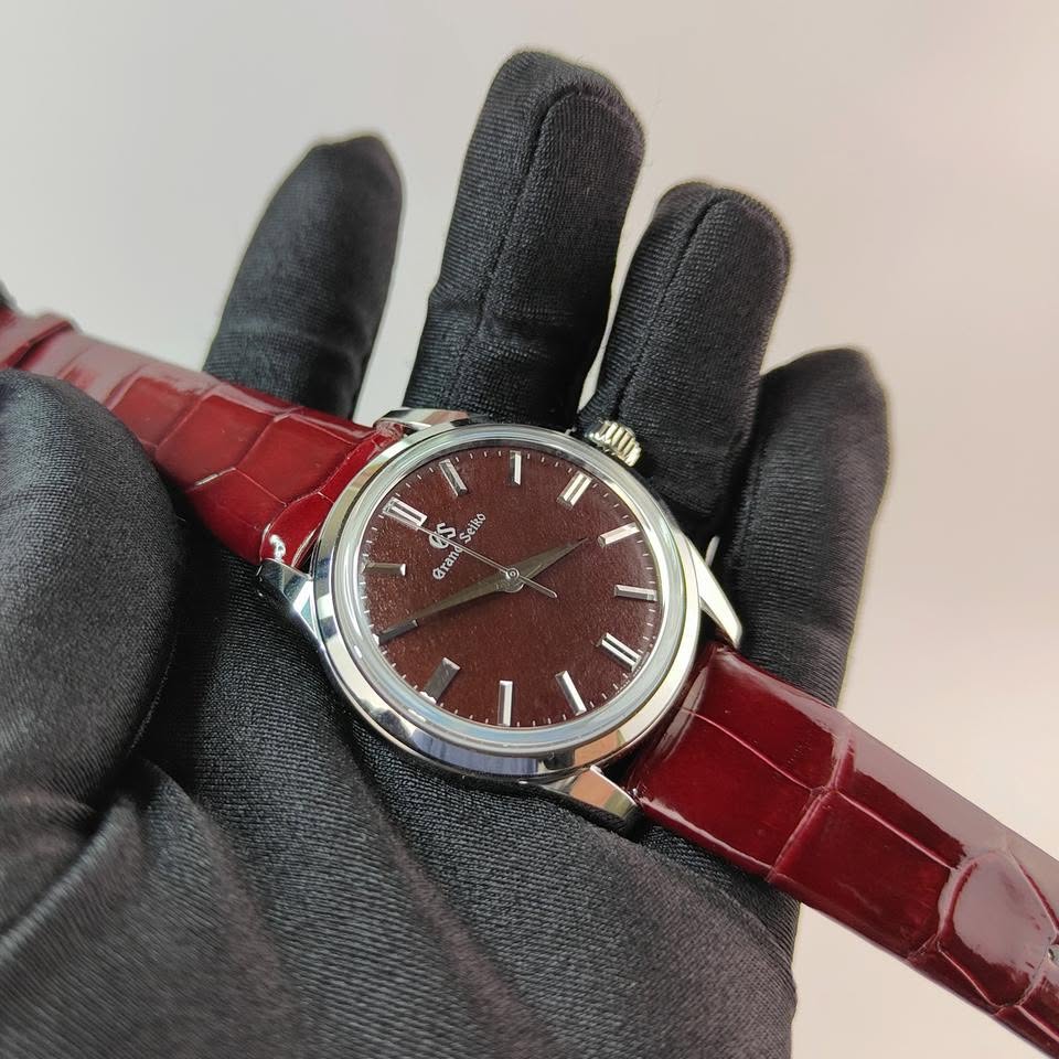 May be an image of leather and wrist watch