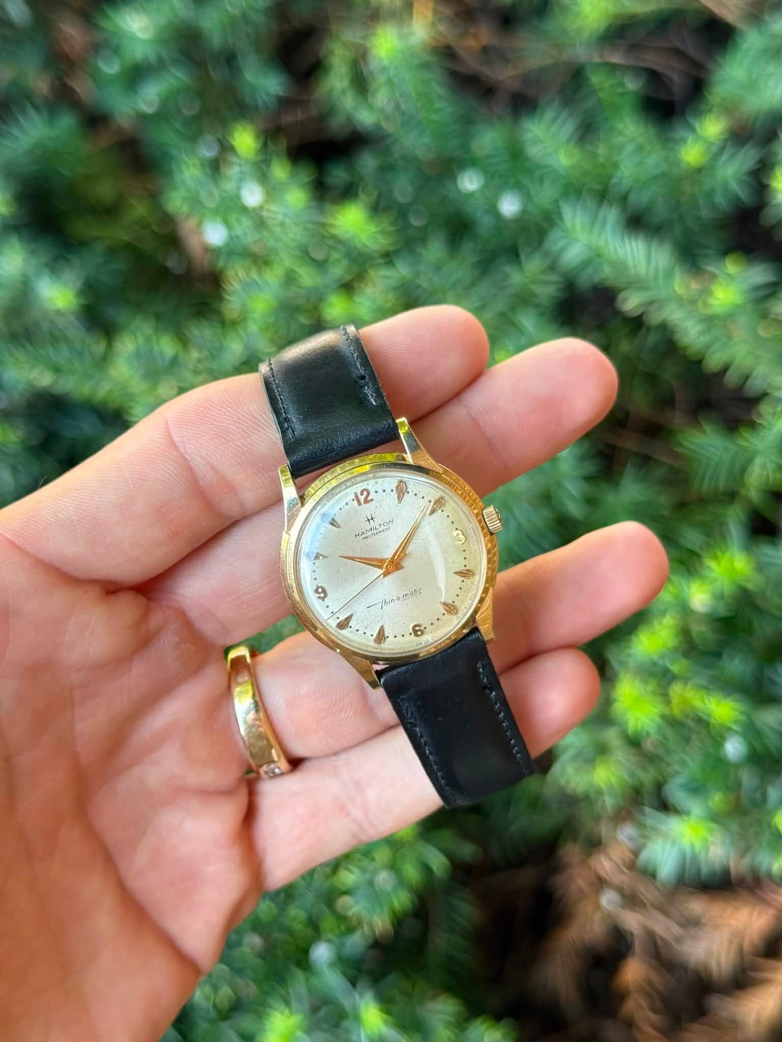 May be an image of wrist watch