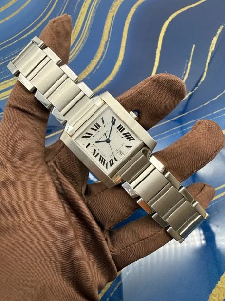 May be an image of digital watch and text