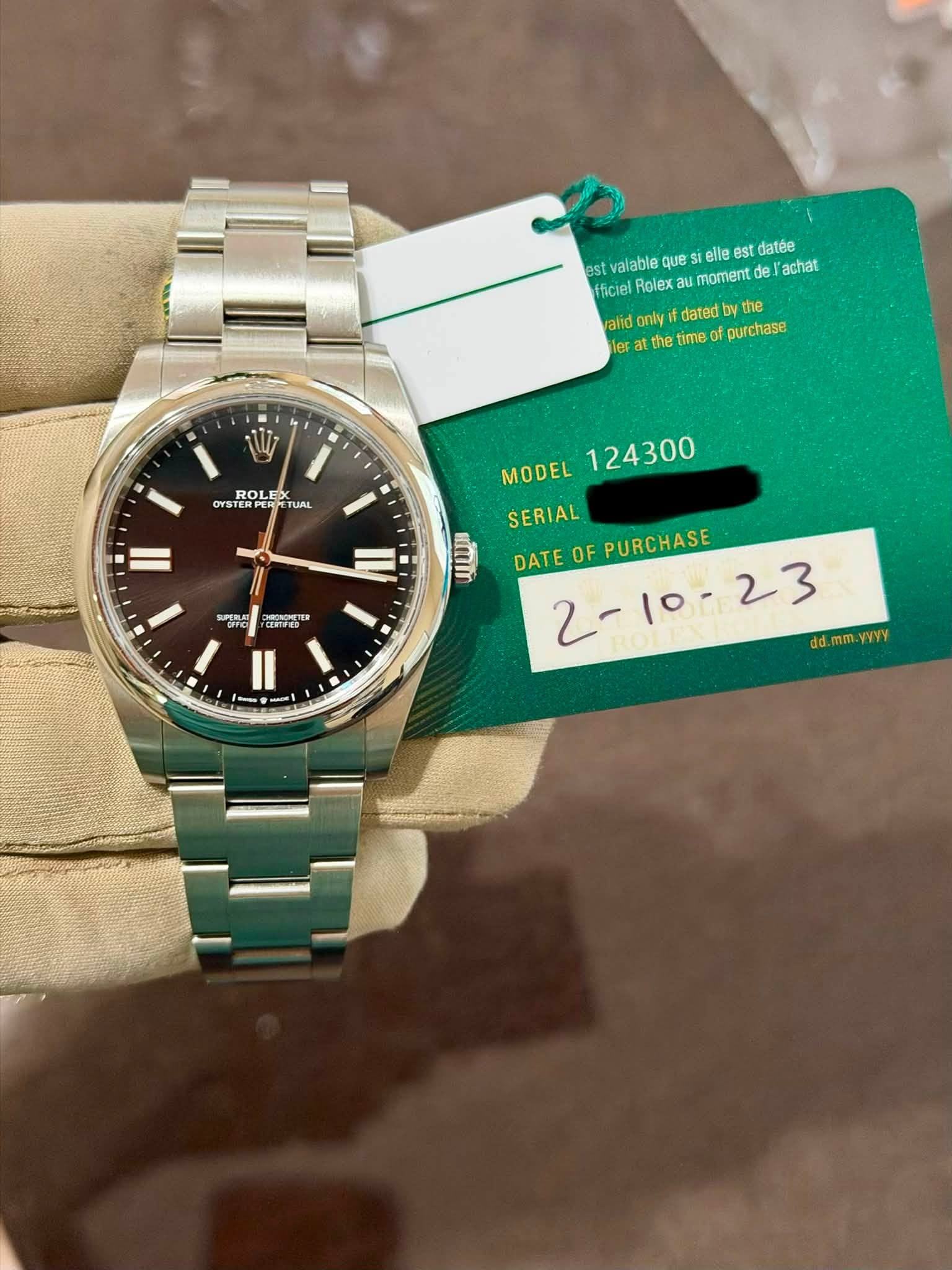 May be an image of wrist watch and text that says 'est valable au moment de achat que elle est datée fficiel Rolex alid only dated byth the eFa the time purchase ROLE OS OYSTER…