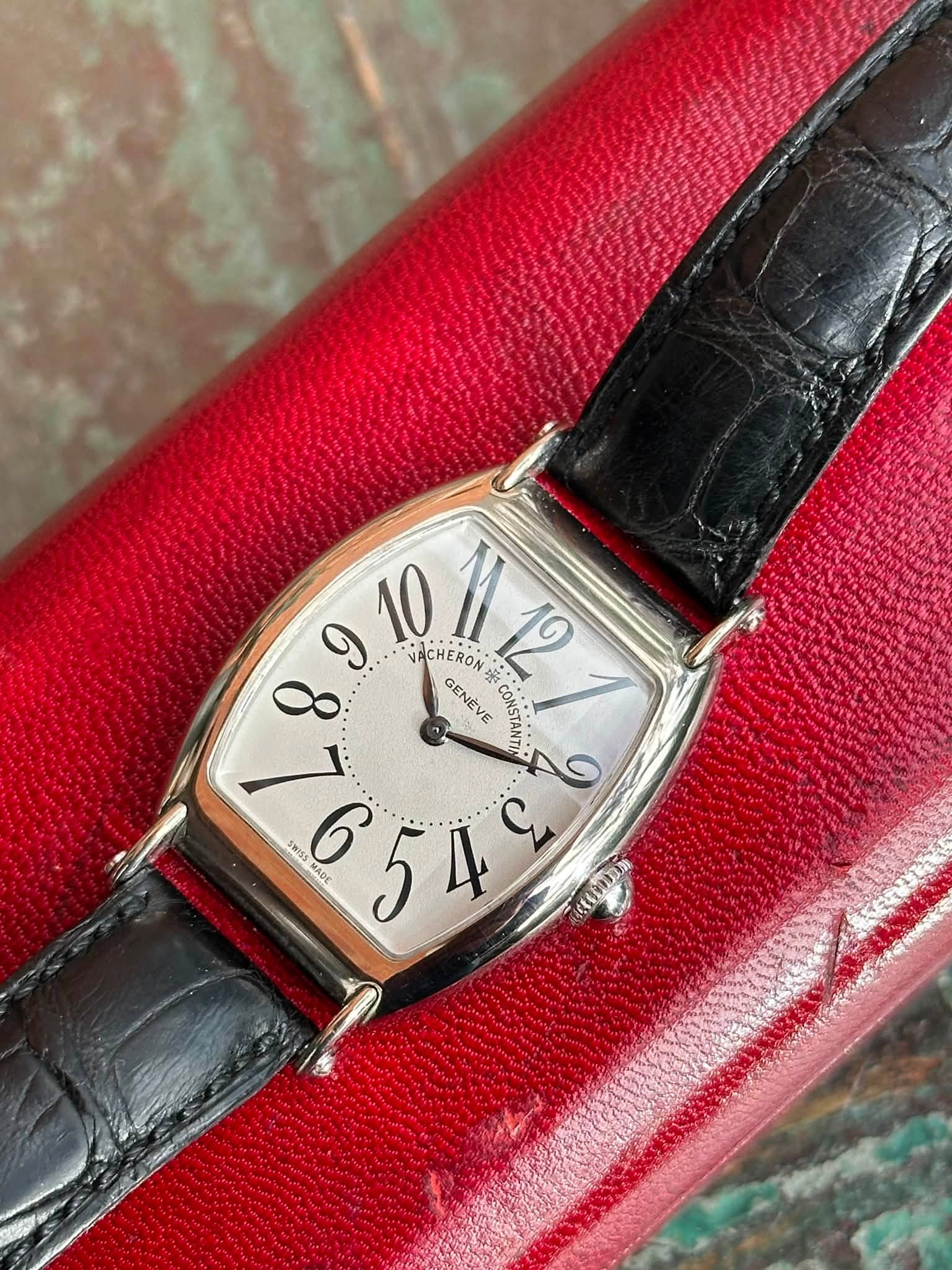 May be an image of wrist watch and text