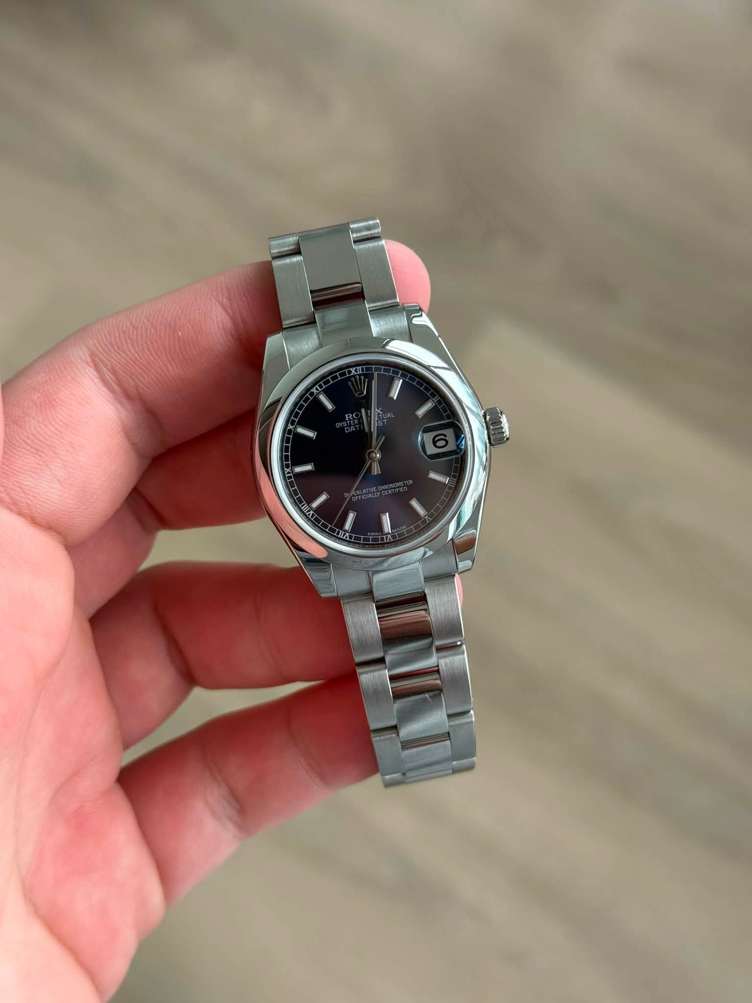 May be an image of wrist watch