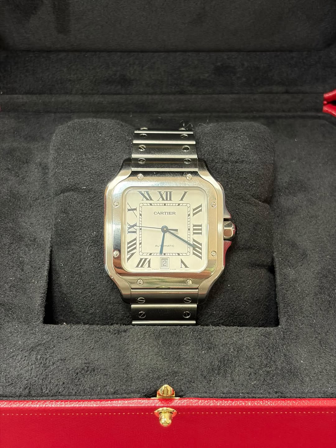 May be an image of wrist watch, timer and text