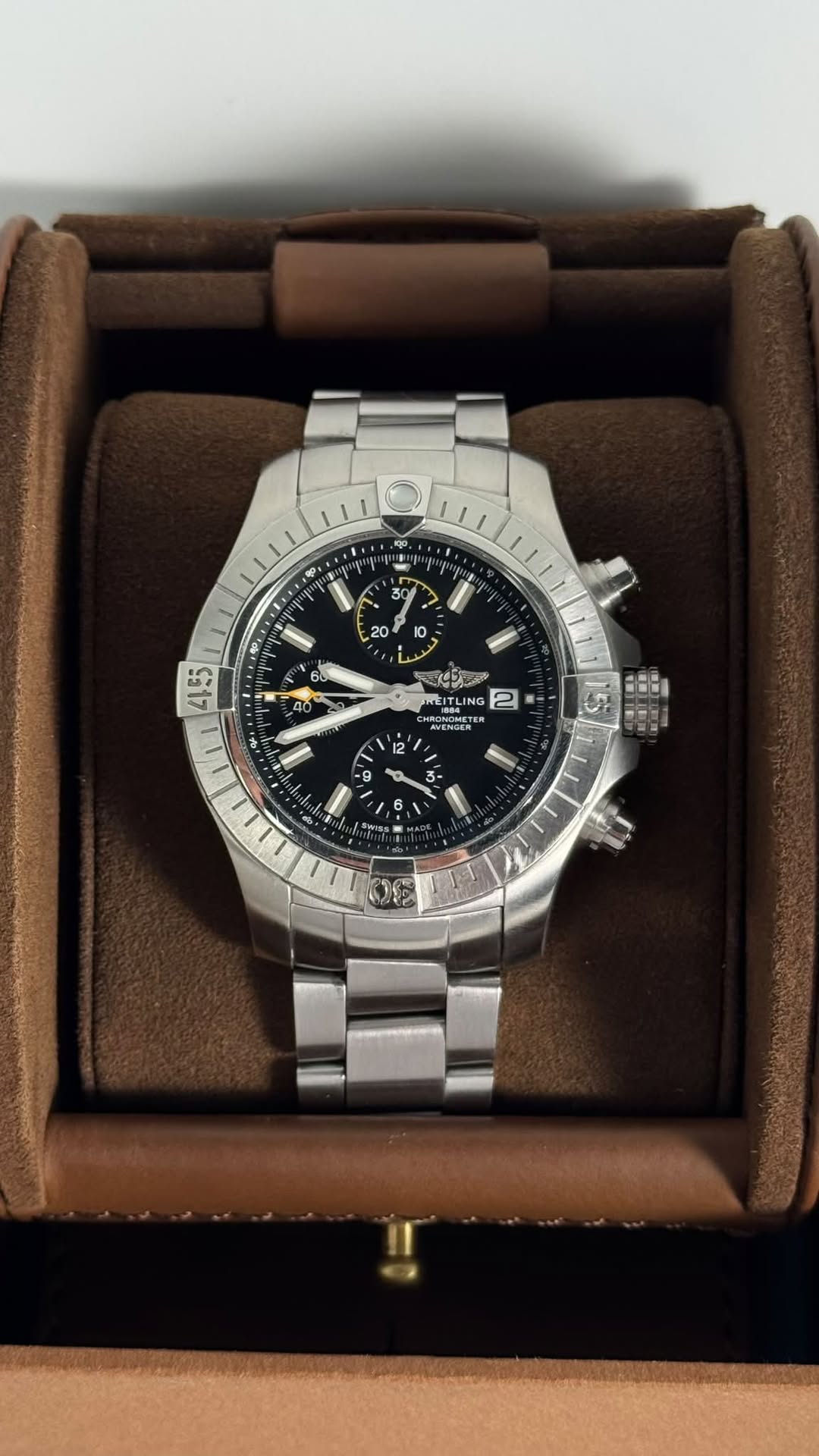 May be an image of wrist watch and text