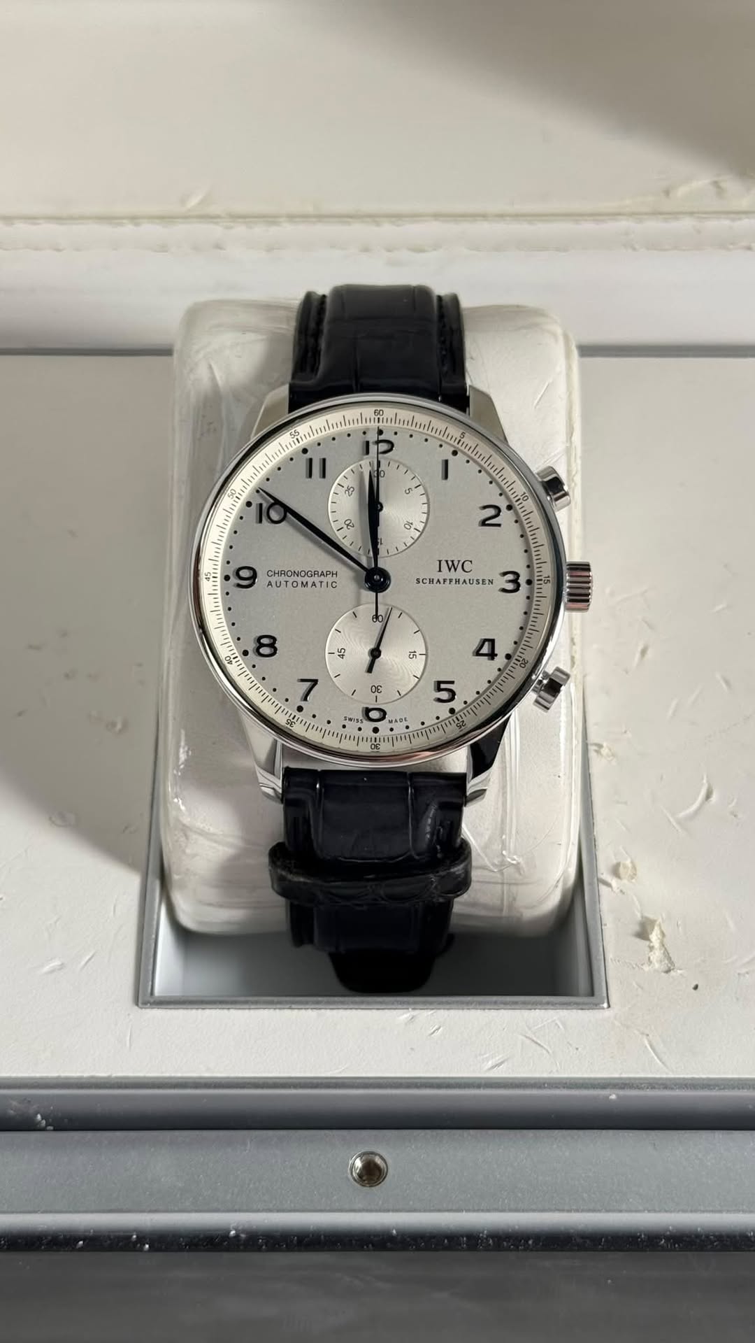 May be an image of wrist watch and text