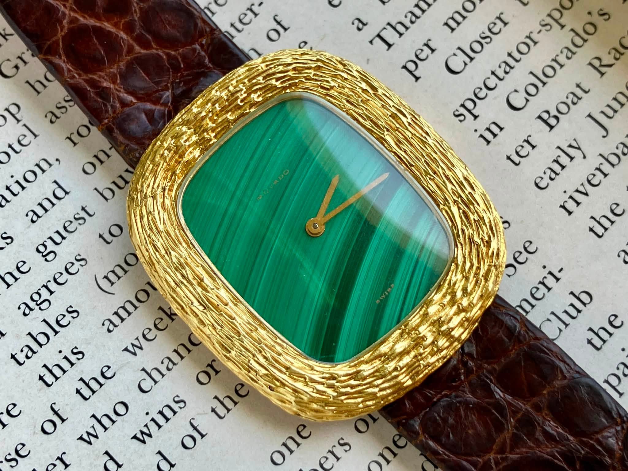 May be an image of wrist watch and jewelry