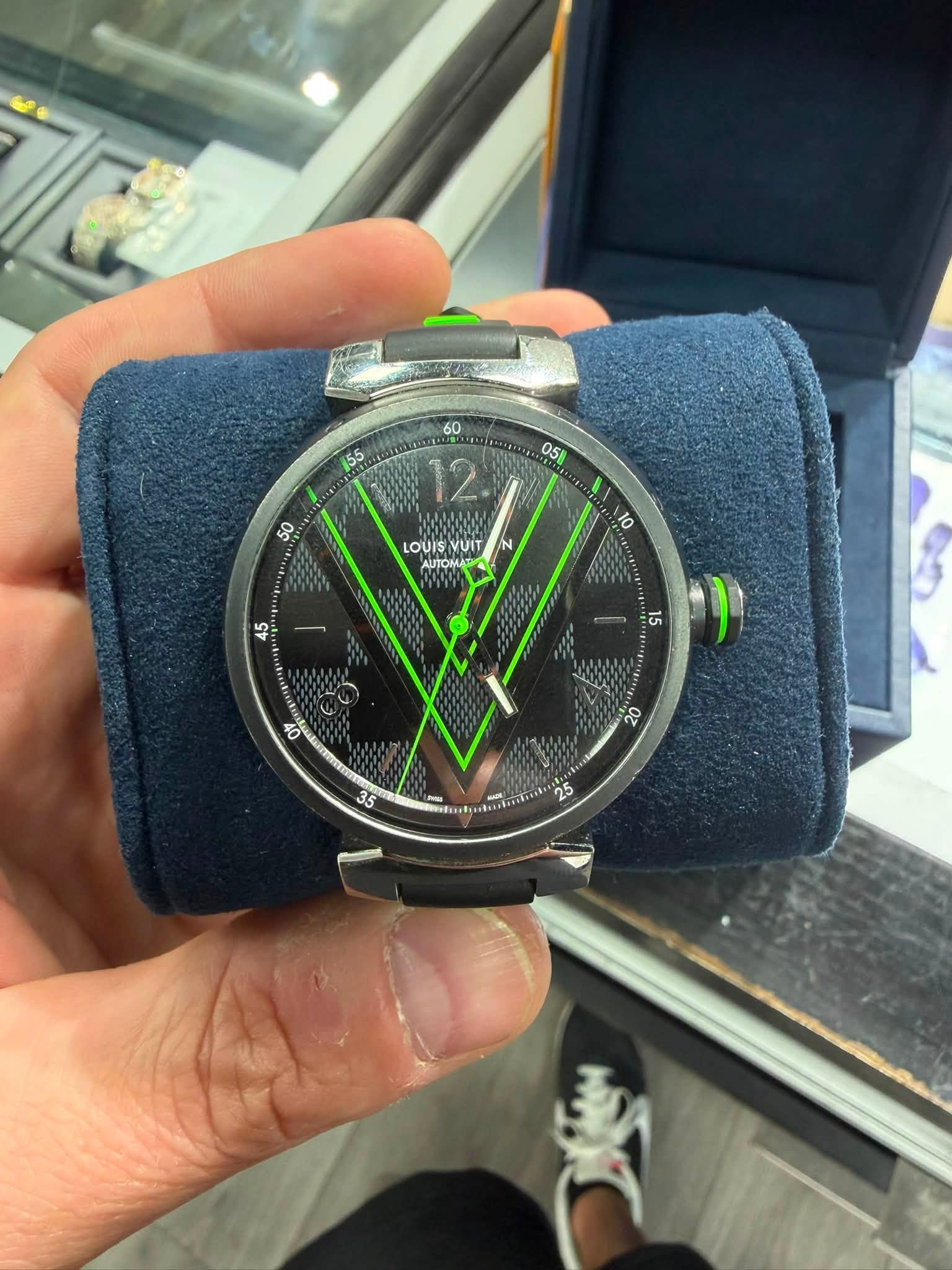 May be an image of digital watch and text