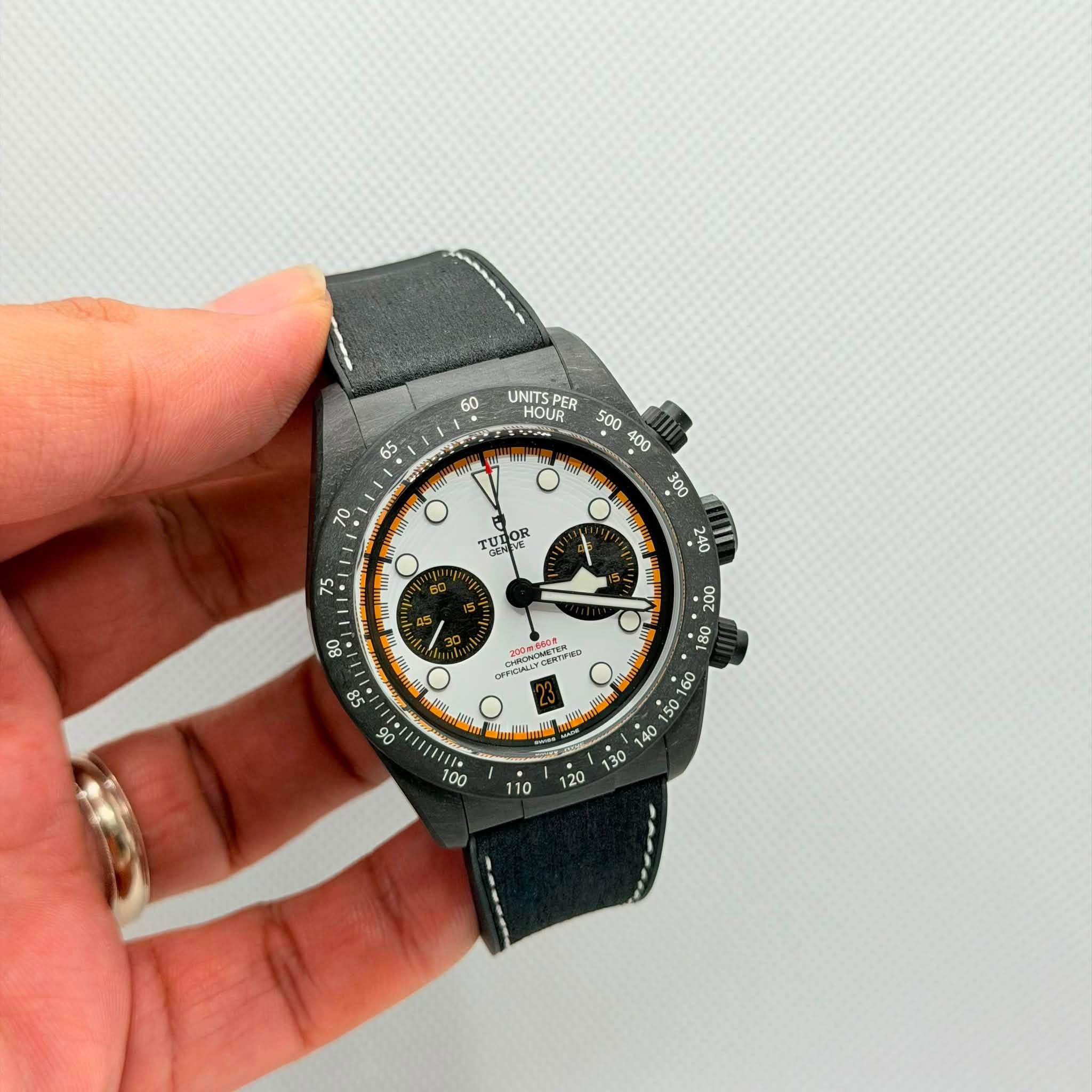 May be an image of wrist watch and text