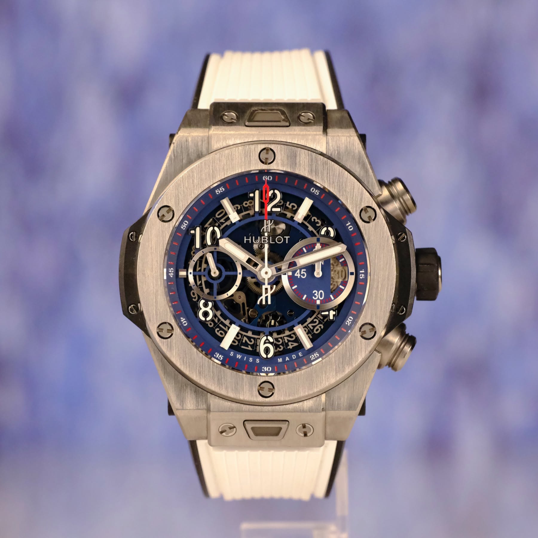 May be an image of wrist watch and text that says '婴ら 0ES e50 A0 12 ম HU HUBLOT BL OT 3 10 חי1 45 + 45 15 0 OC 小 30 1 a0 26 สอ 방1 1 30 かか'