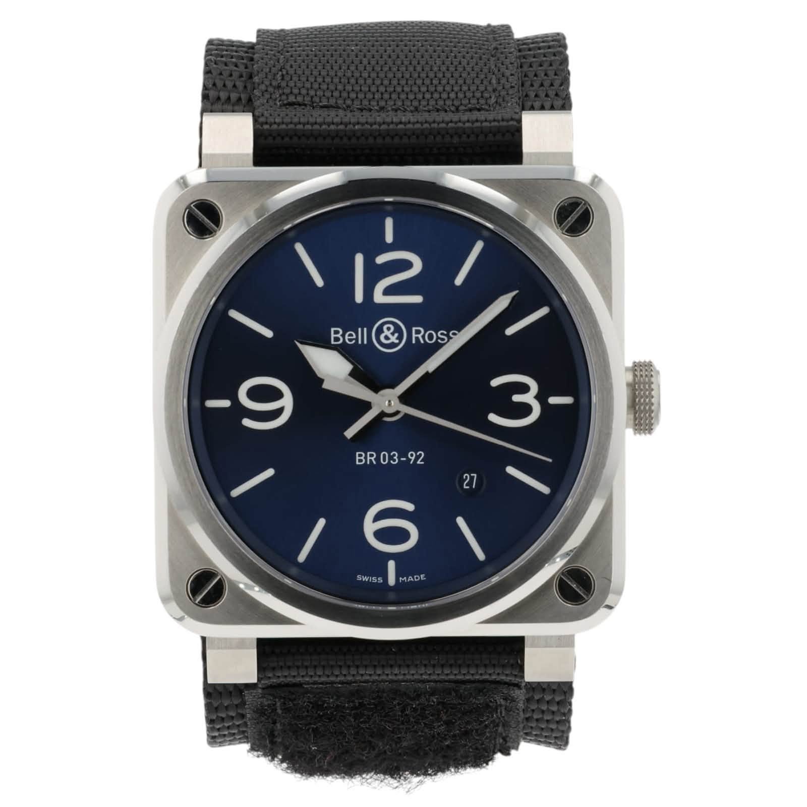May be an image of digital watch and text that says '211 12 Bell Ross 9 BR03- SWISS MADE AD'