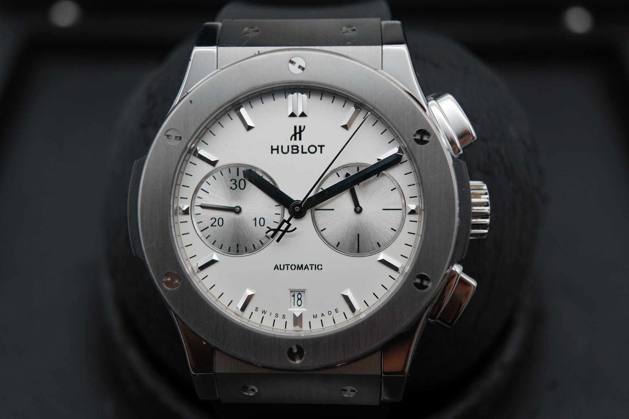 May be an image of wrist watch and text
