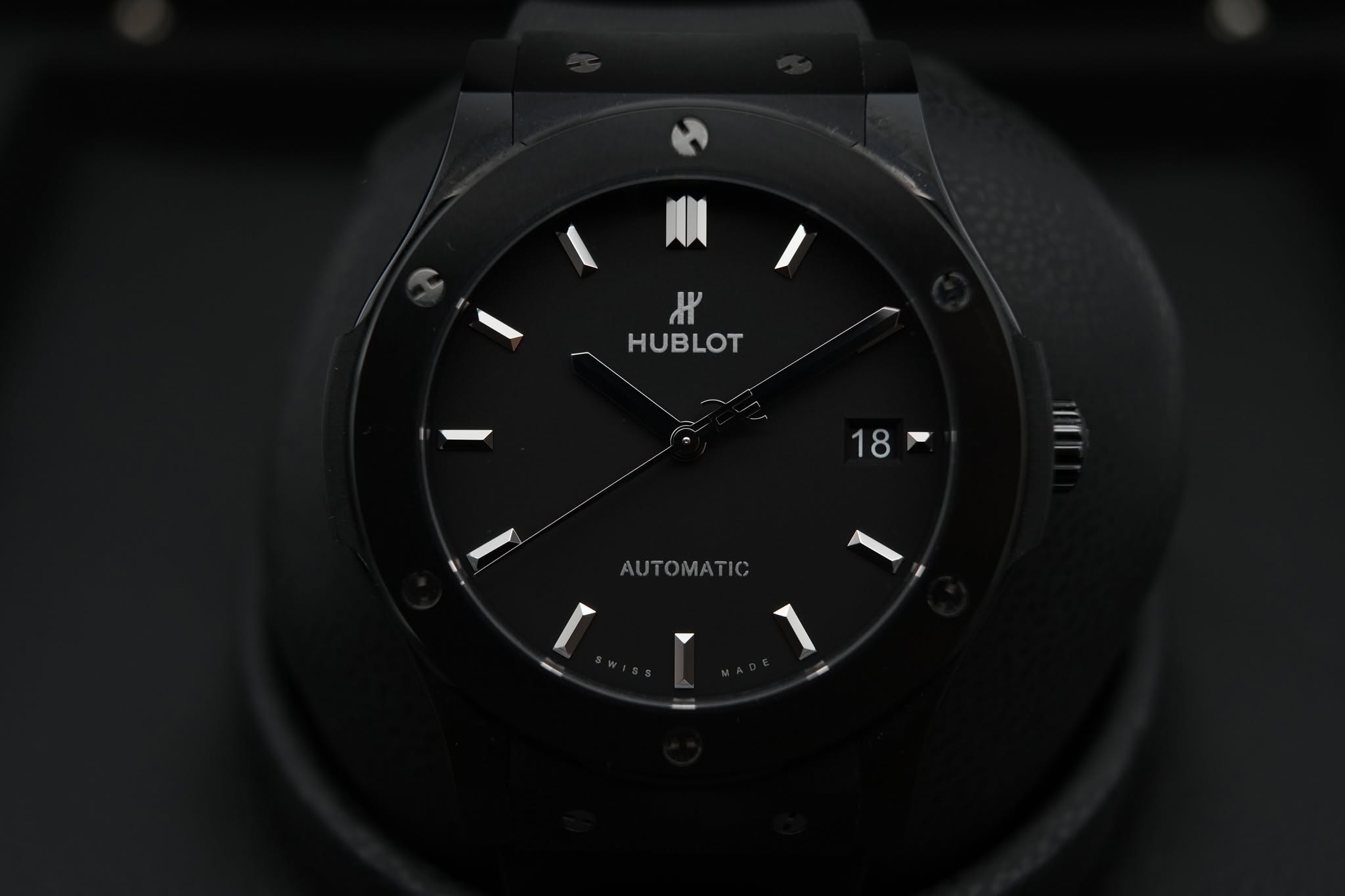 May be an image of ‎digital watch and ‎text that says '‎א HUBLOT 18 AUTOMATIC‎'‎‎