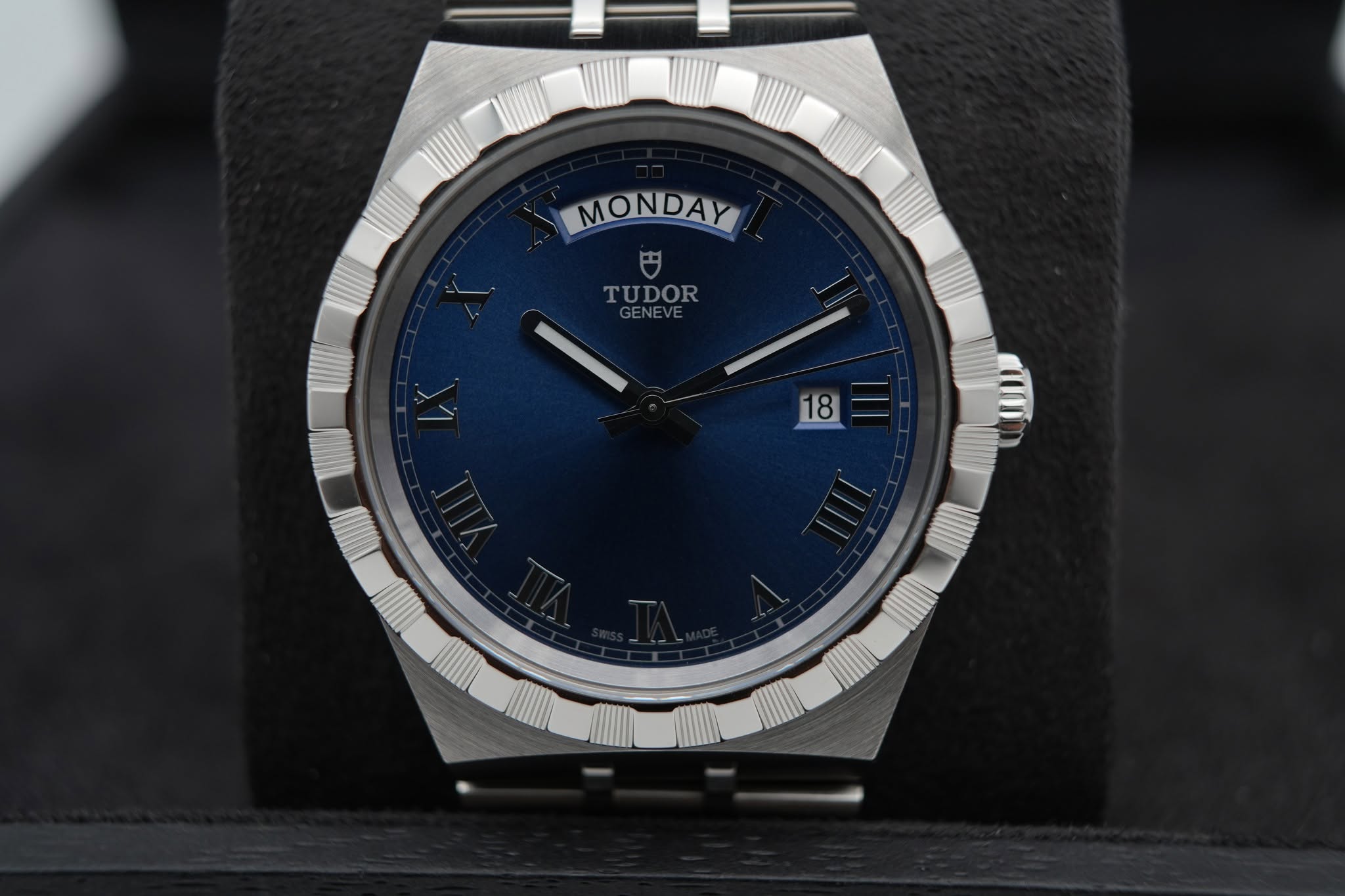 May be an image of wrist watch and text