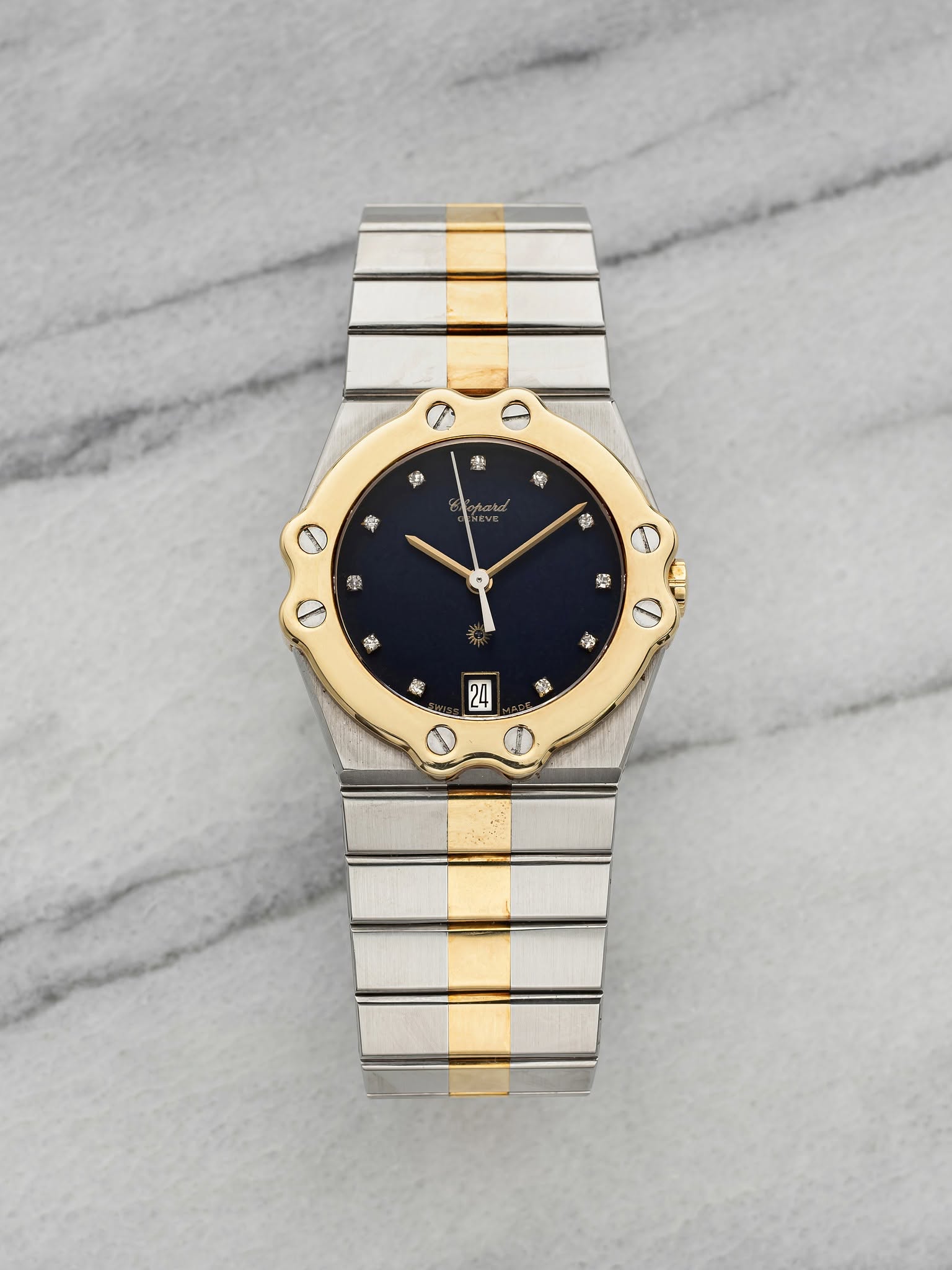 May be an image of wrist watch and text