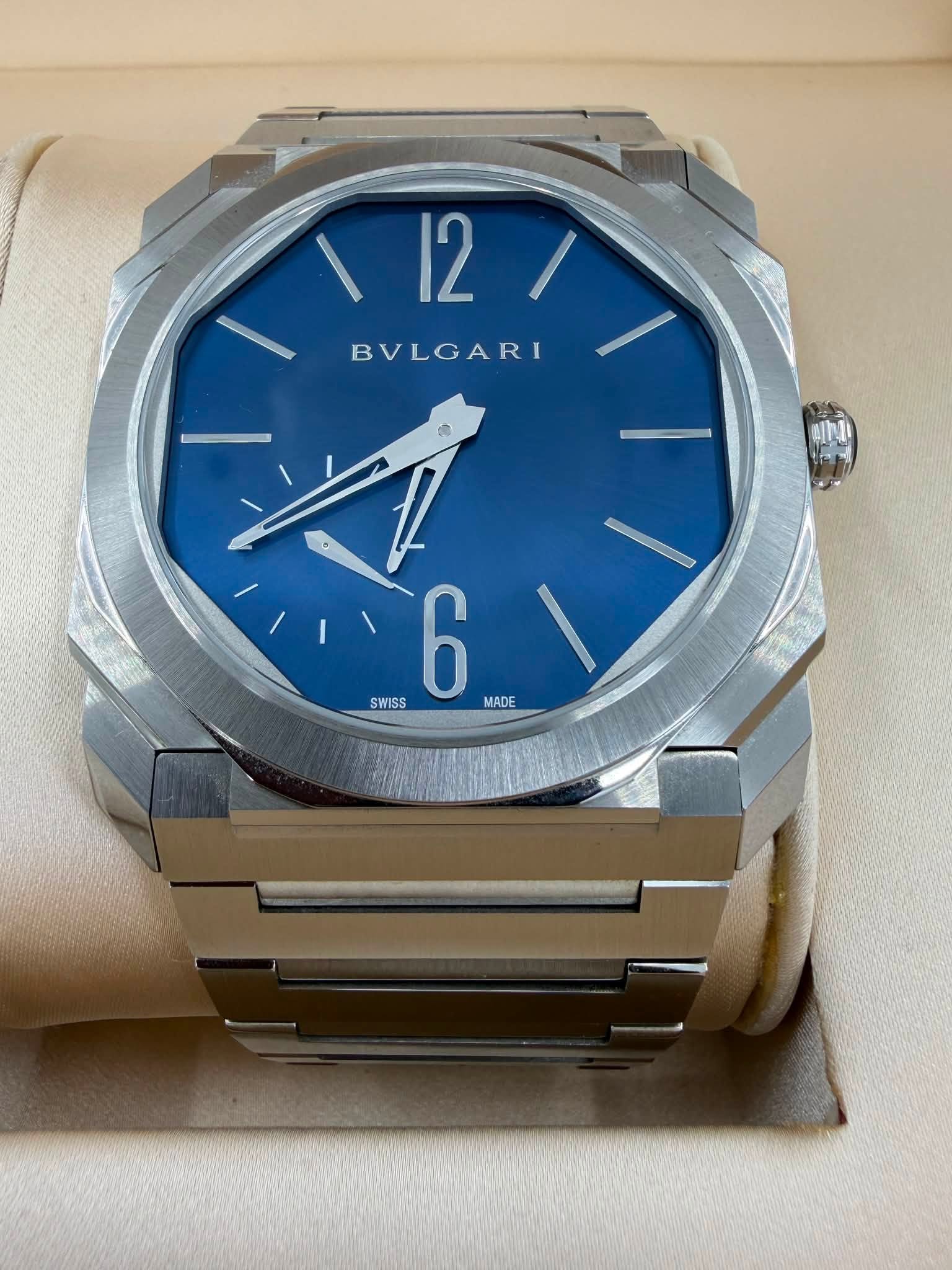 May be an image of wrist watch and text that says '12 BVLGARI SWISS 601 6 MADE'
