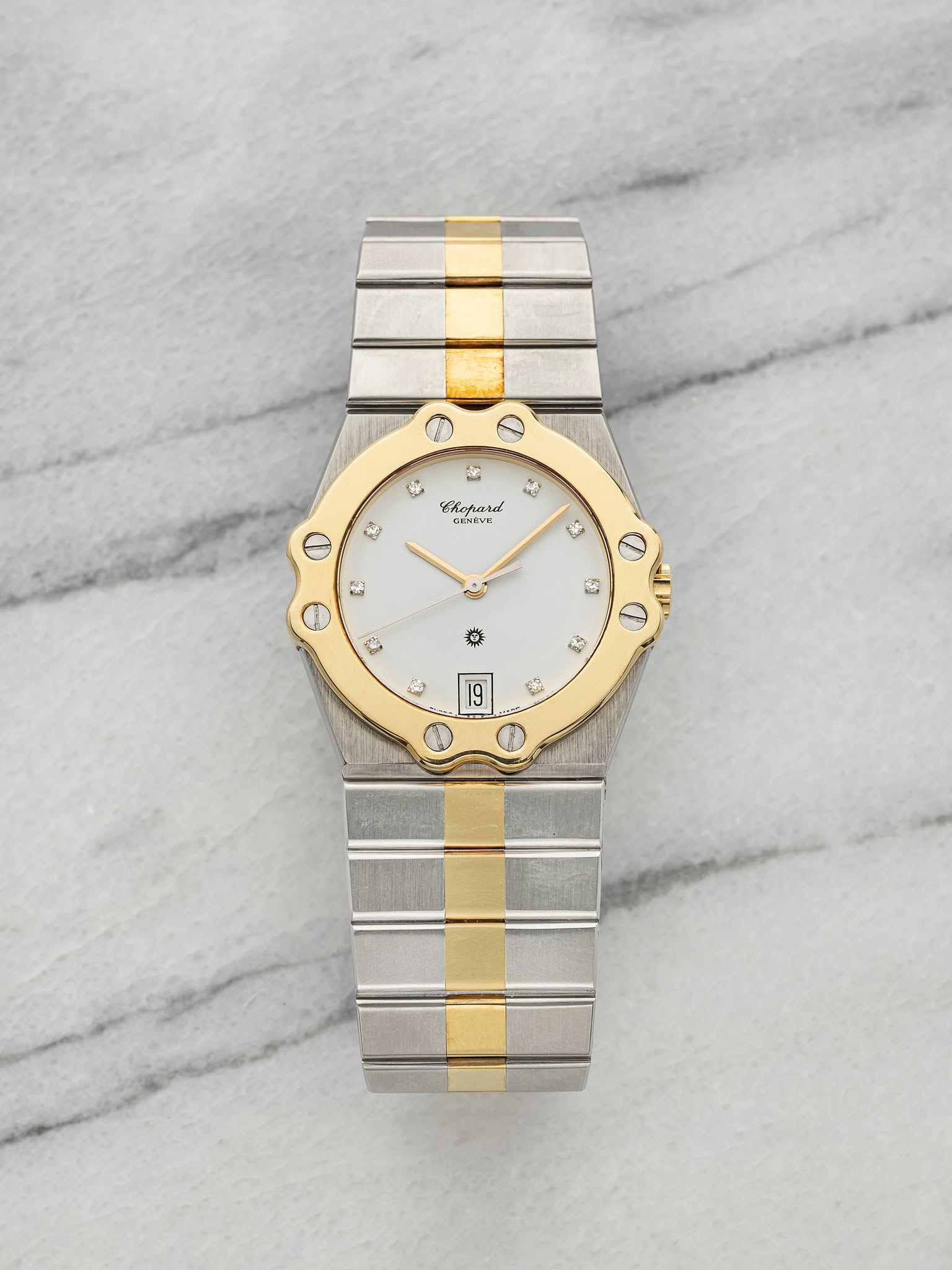 May be an image of wrist watch and text