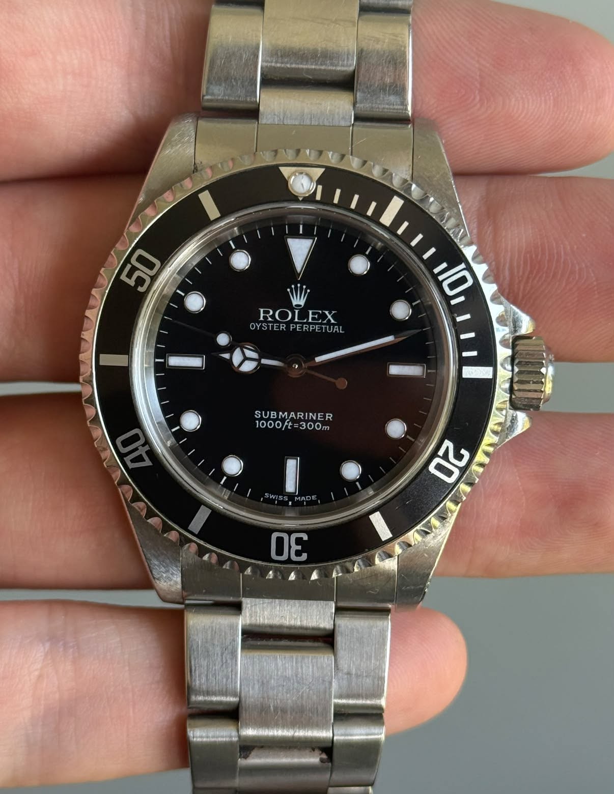 May be an image of wrist watch and text that says '50 ROLEX OYSTER OYST YSTERPERPETUAL TEE 10 SUBMARINER MARIT 1000f 1000ft=300m t= 300m 2 30 BлeHифewbmbl'