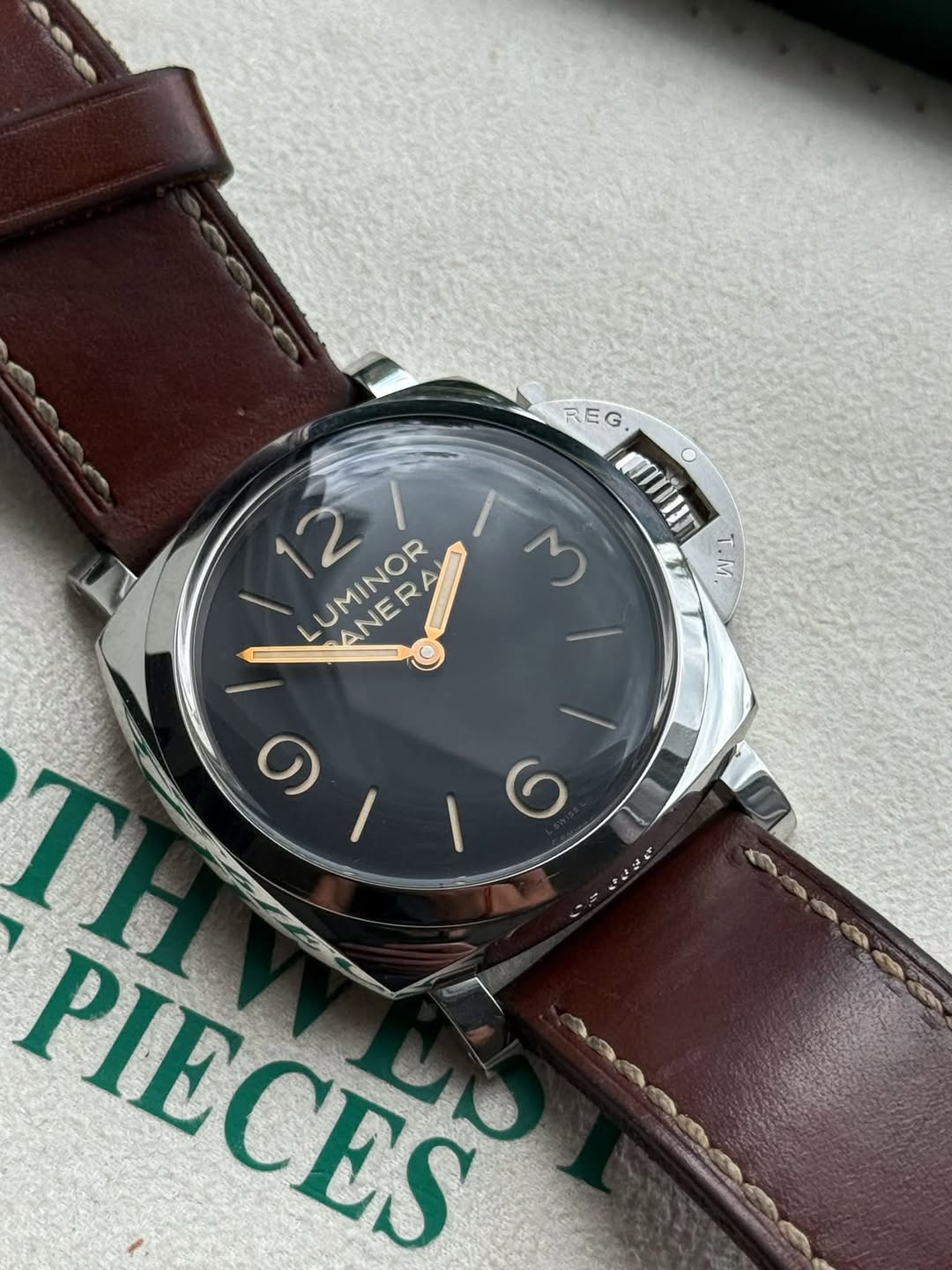 May be an image of wrist watch and text
