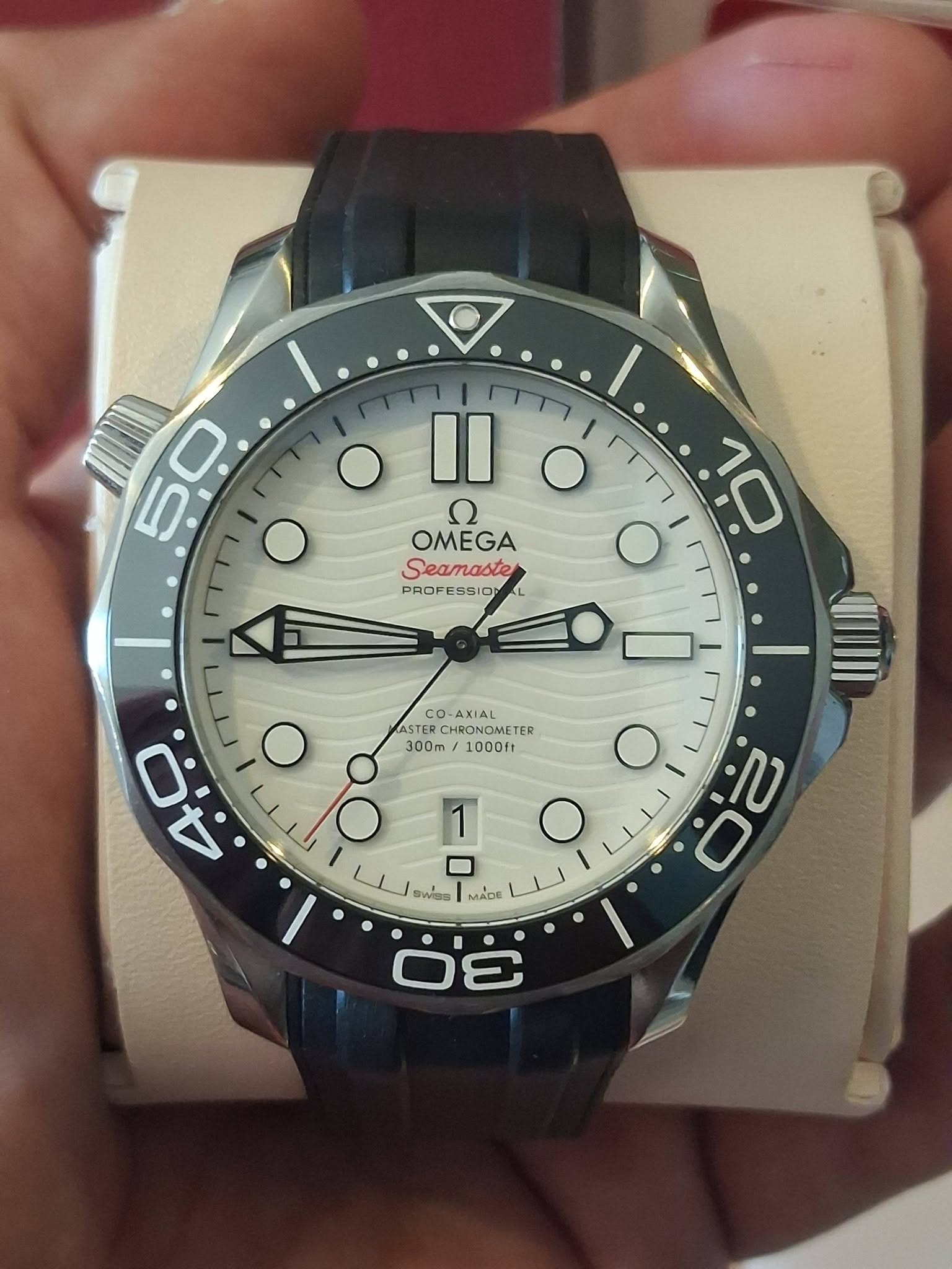 May be an image of wrist watch and text that says '50 CO -AXIAL ASTER CHRONOME ER 300m 1000ft Il O لسا 10 ח OMEGA Seamaste PROF PROFESSIO CIII O O 80 2 Bwins 2a MADE 30 3 لل ب L…