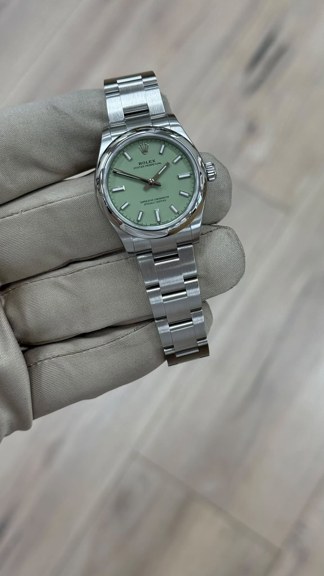 May be an image of wrist watch and text
