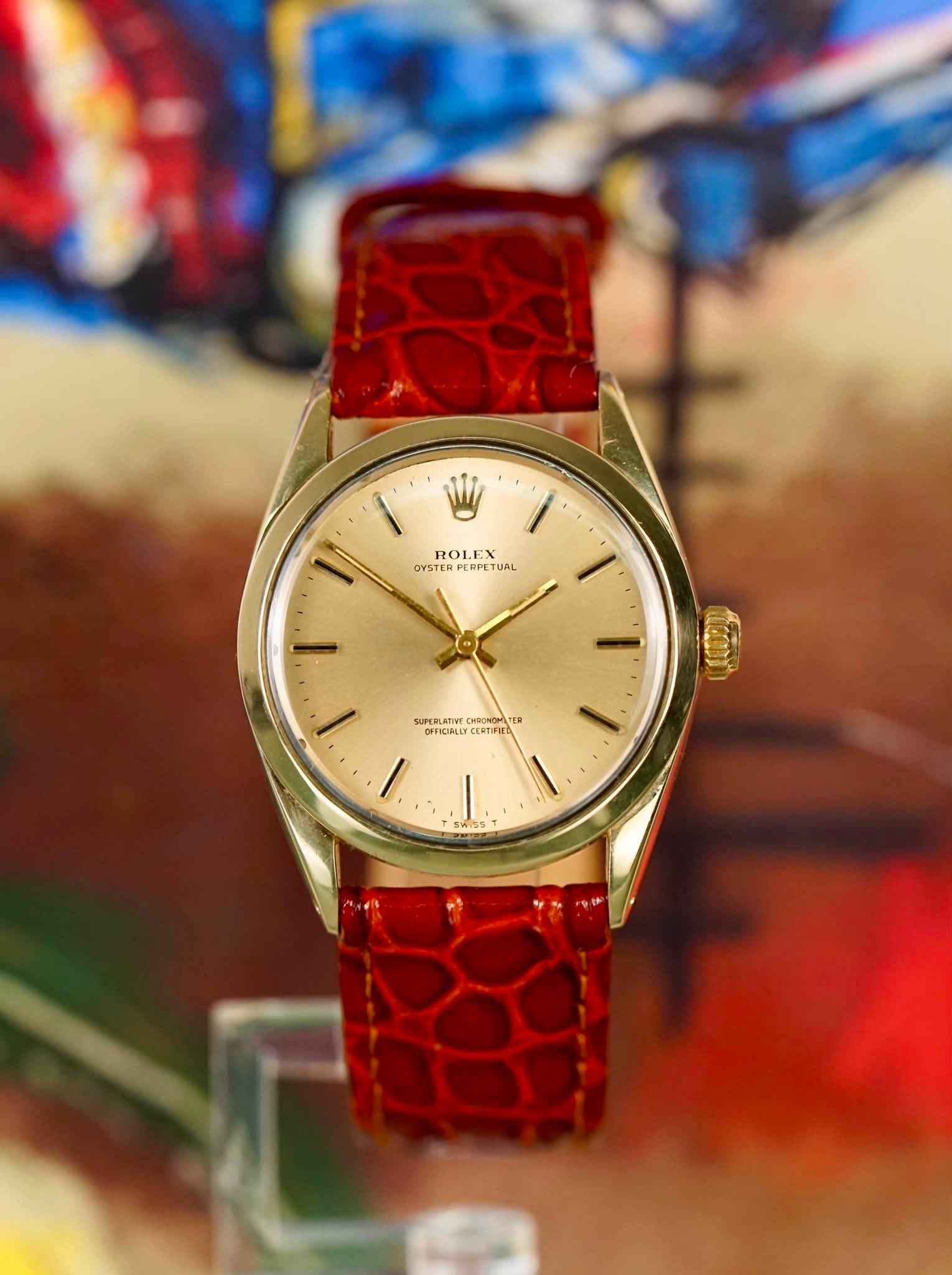 May be an image of wrist watch and text