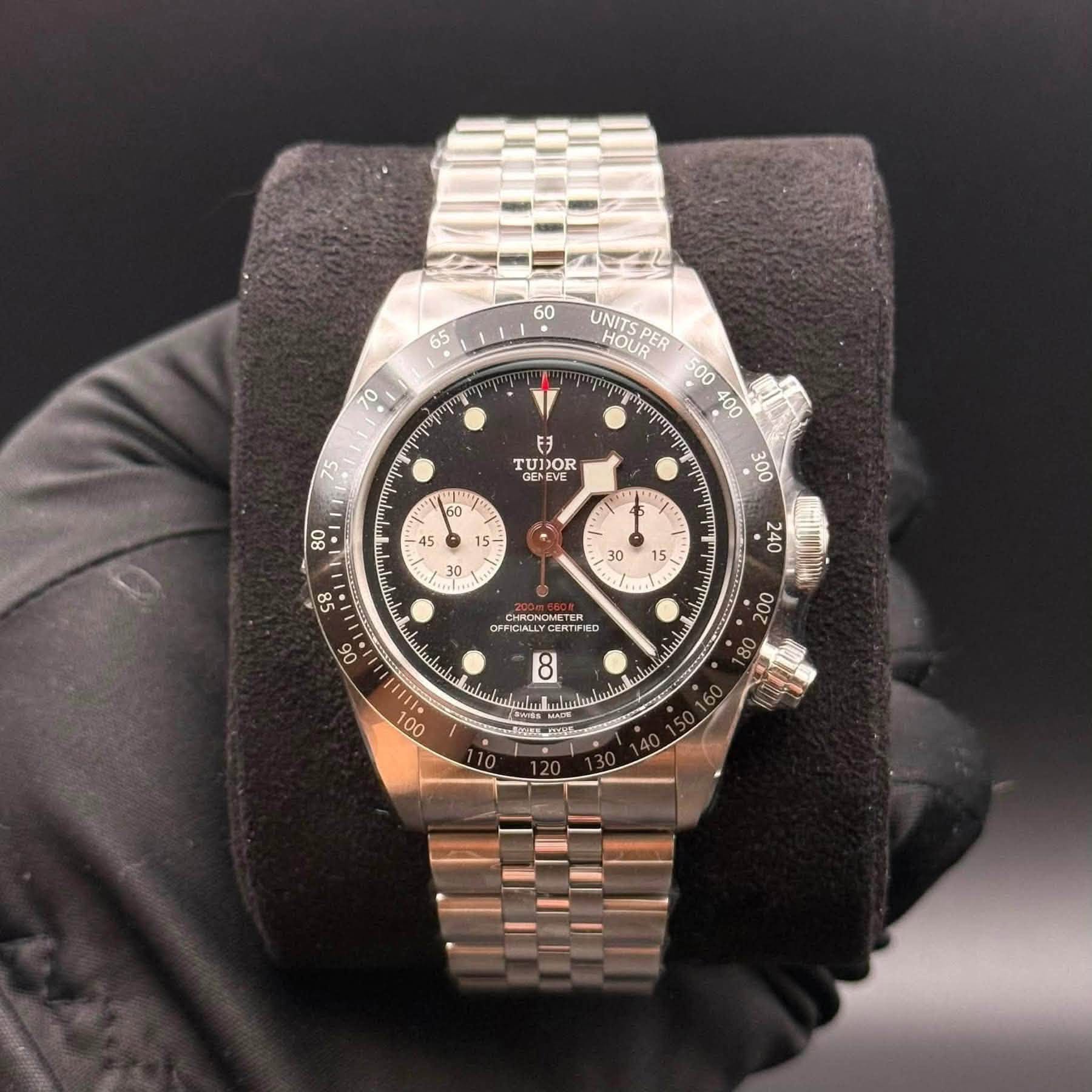 May be an image of wrist watch and text