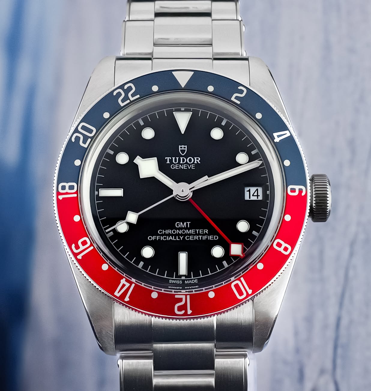 May be an image of wrist watch and text that says '22 20 2 TUDOR GENEVE 18 14 6 GMT CHRON METER OFF OFFICIALLY CIALLY CERTIFIED TIFIE 16 14 8 SWISS MADE พรนพา 12 10'