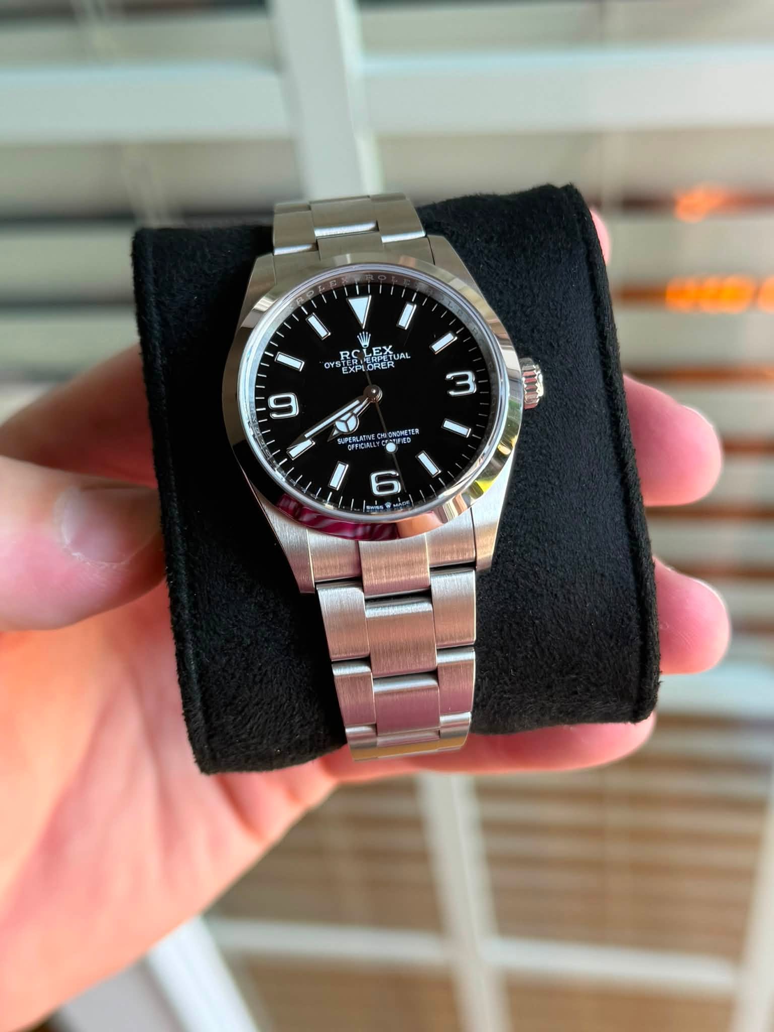 May be an image of wrist watch and text