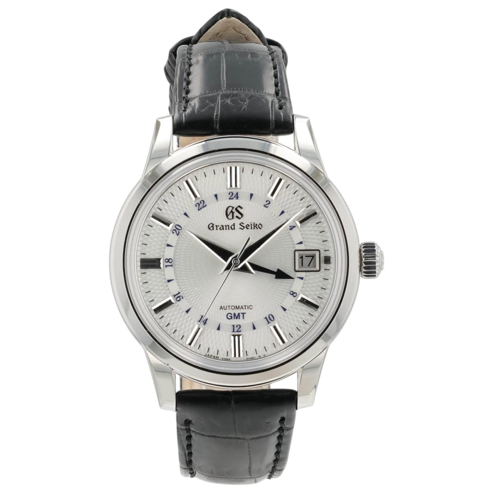 May be an image of wrist watch and text that says 'l' 22 I 2 24 1 GS Grand GrandSeiko Seiko C0Q00011 8 14 AUTOMATIC GMT የኃሆ.ይ'