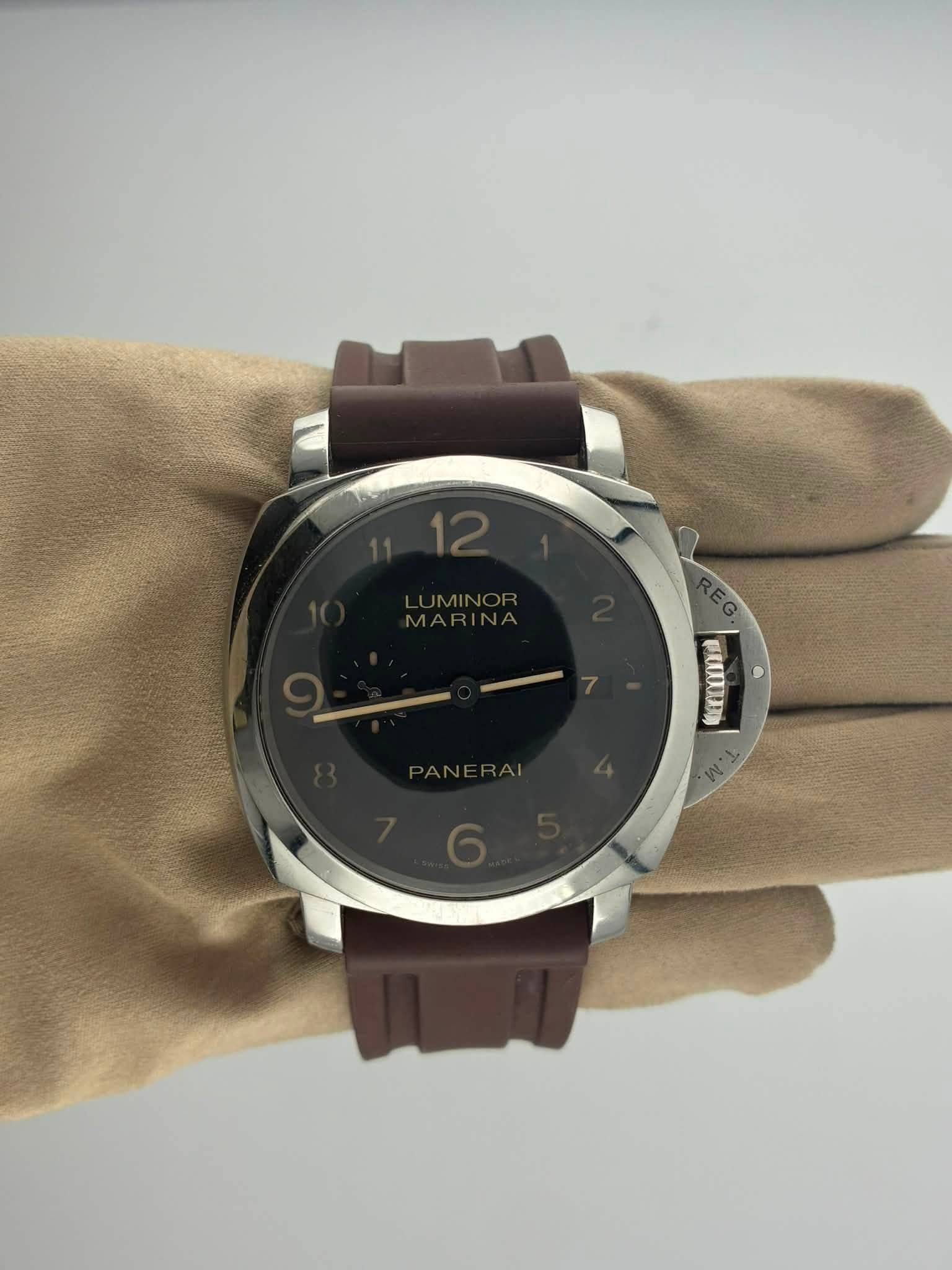 May be an image of wrist watch and text