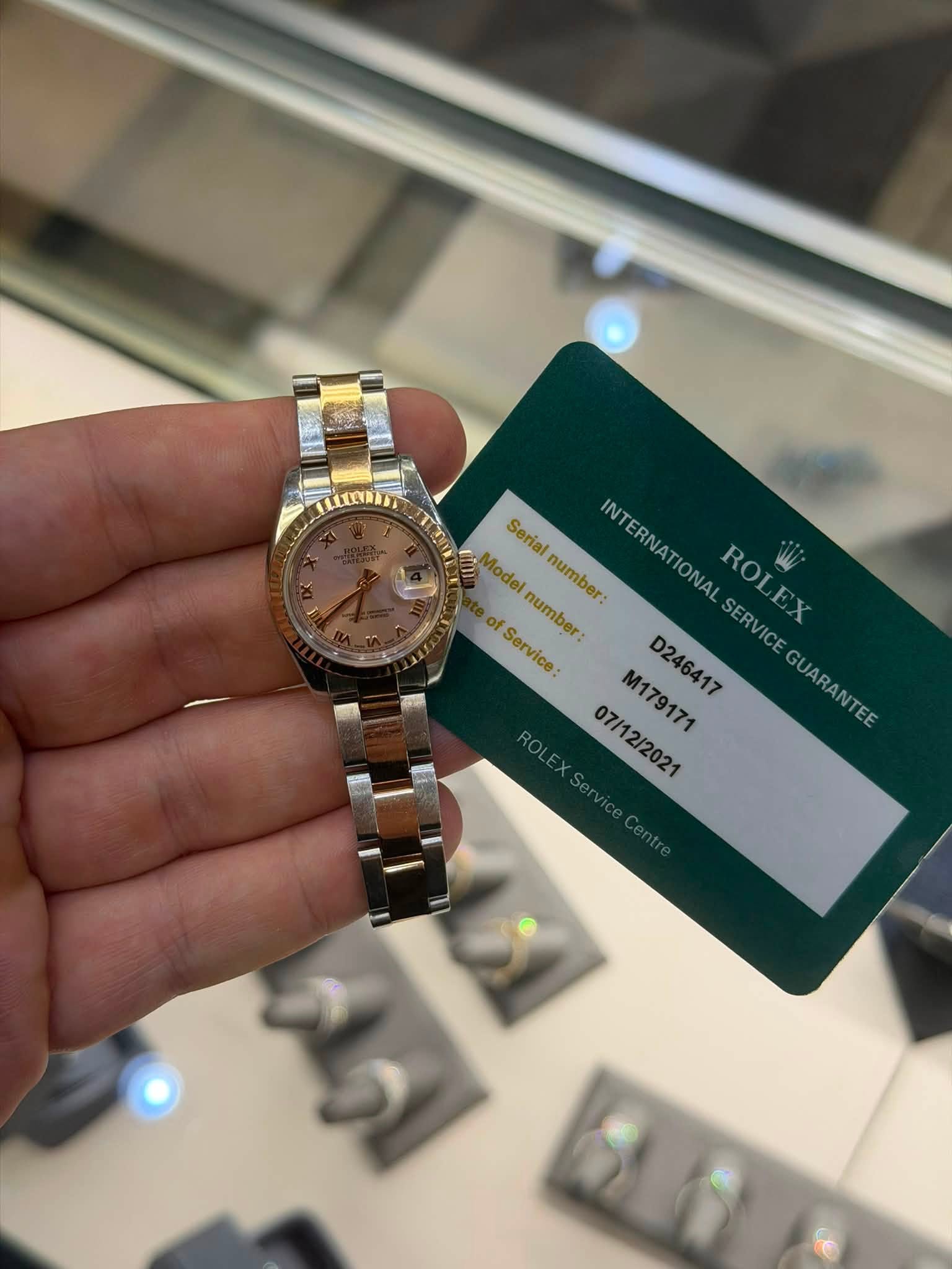 May be an image of wrist watch and text that says 'Serial UI Modelnumber: o of number: .Model number: INT INTERNATIONAL IONAL ROLEX ROL WW Service: SERVICE E GUARANTEE GUARANTEE…