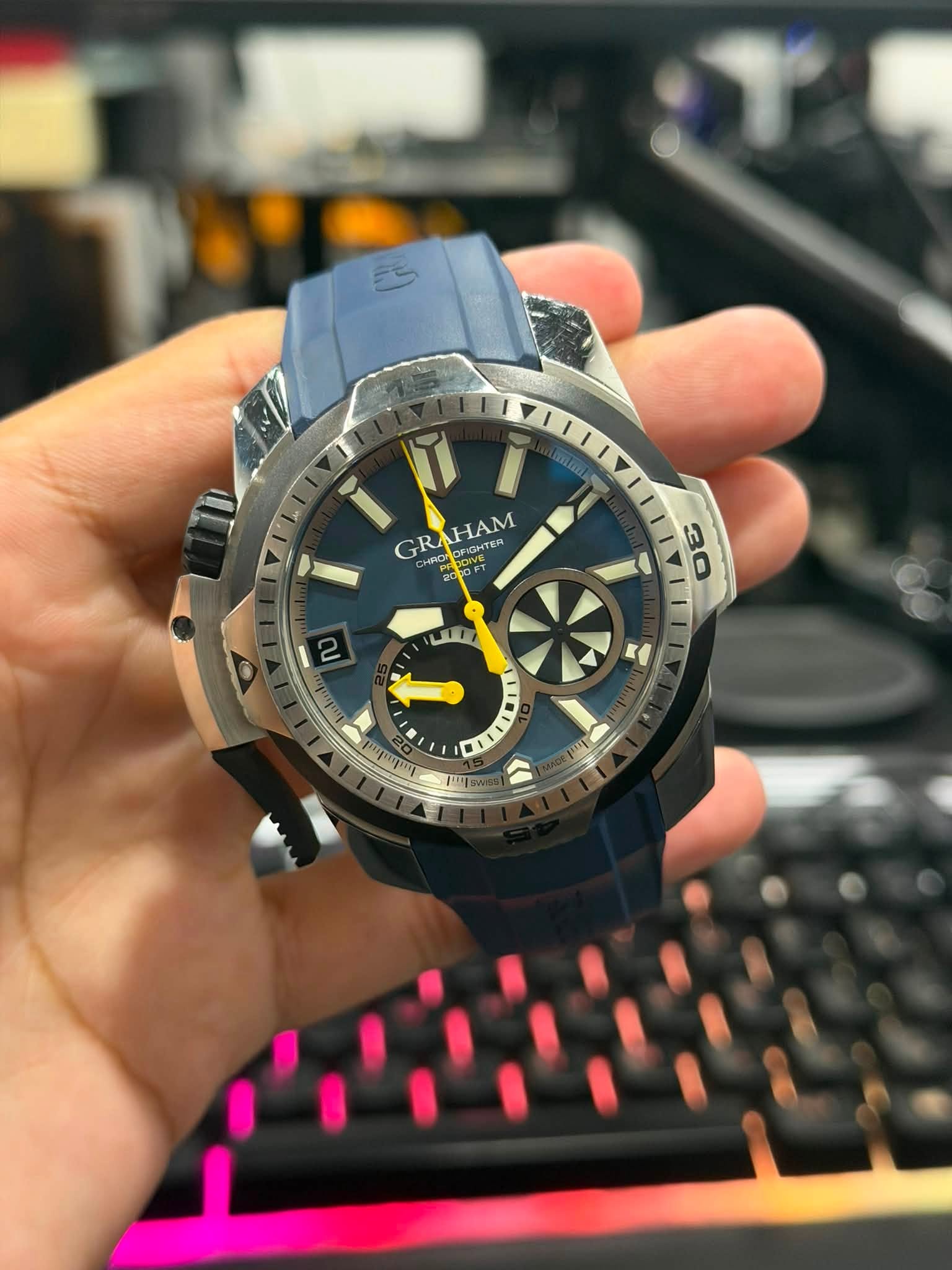 May be an image of wrist watch and text